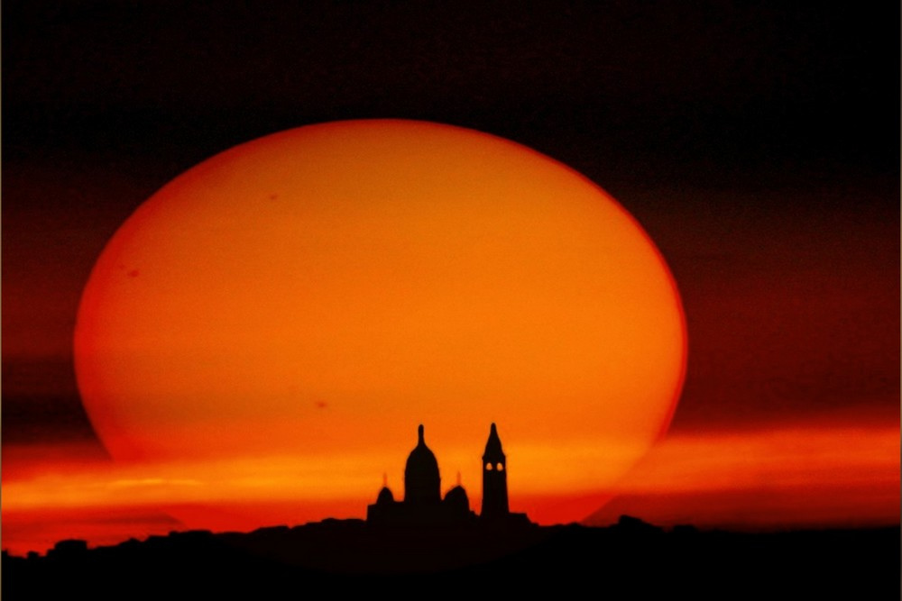 APOD: 2012 July 4 – Sunspots and Silhouettes