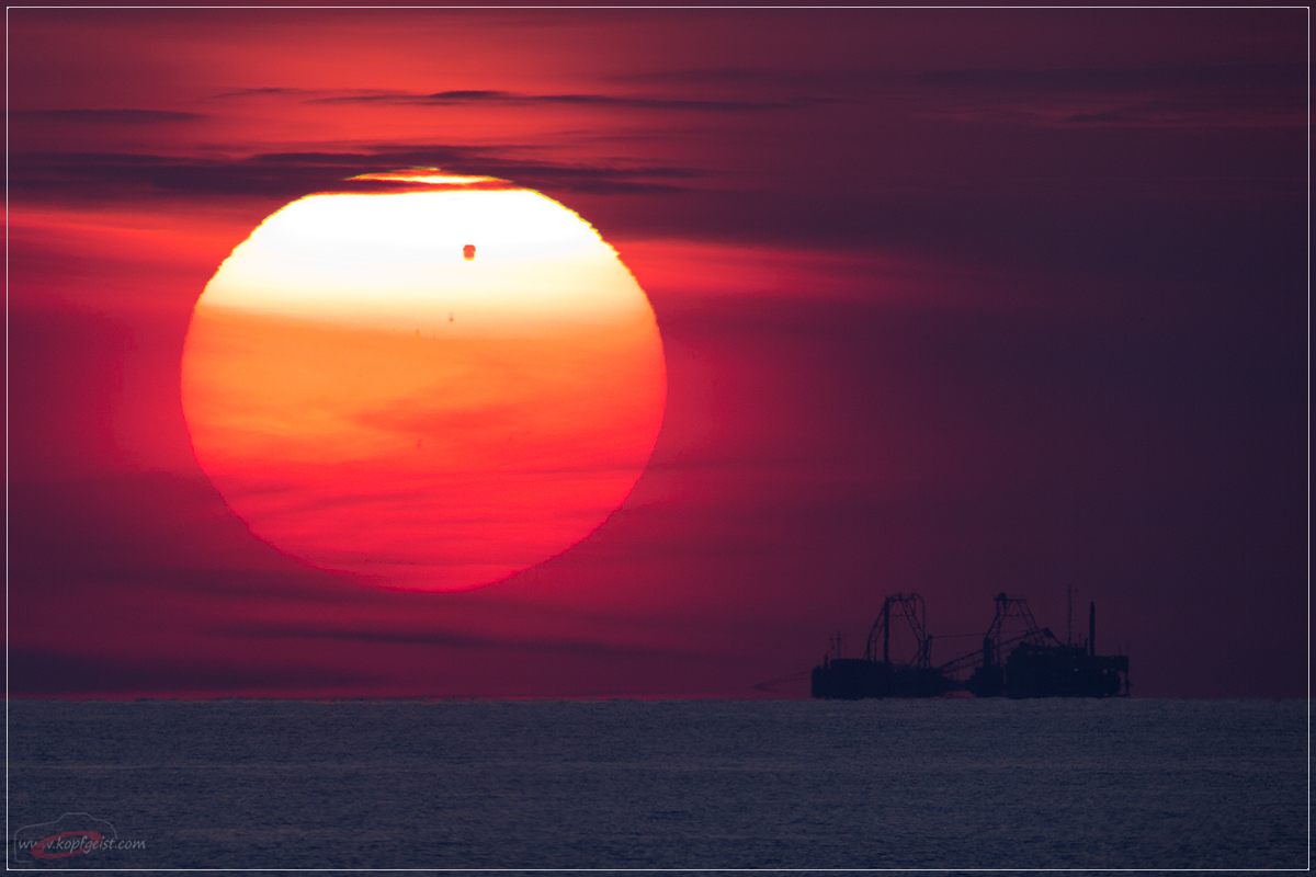 APOD: 2012 June 13 – A Venus Transit Over the Baltic Sea