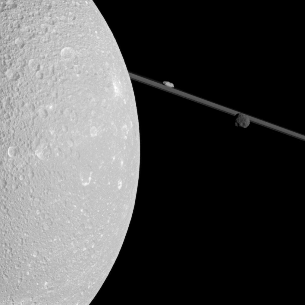 APOD: 2012 May 21 – A Close Pass of Saturn’s Moon Dione
