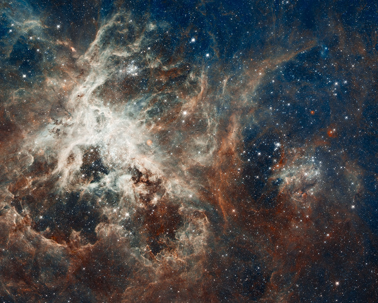APOD: 2012 May 16 – Star Formation in the Tarantula Nebula