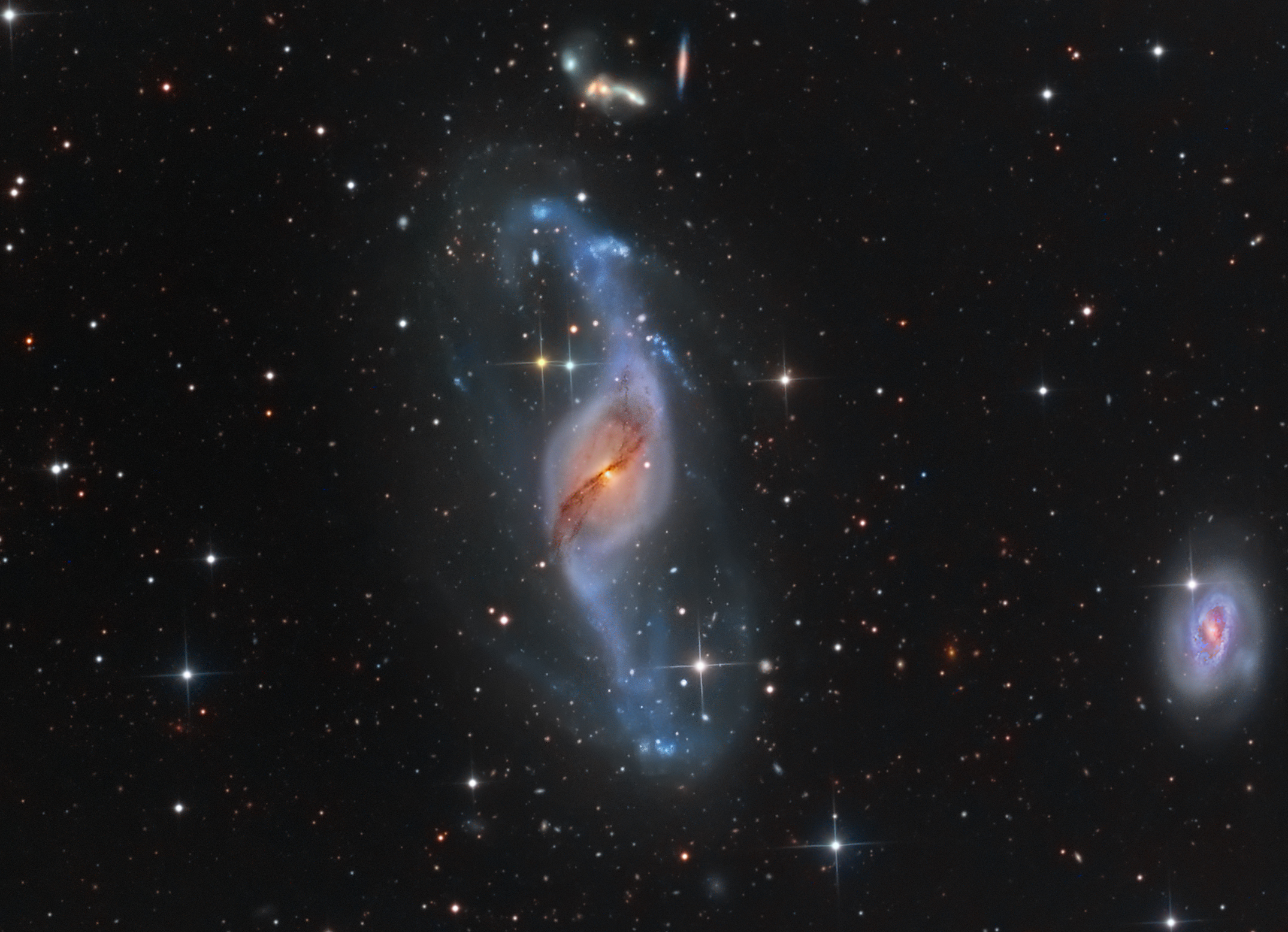 APOD: 2013 August 3 – Twisting with NGC 3718