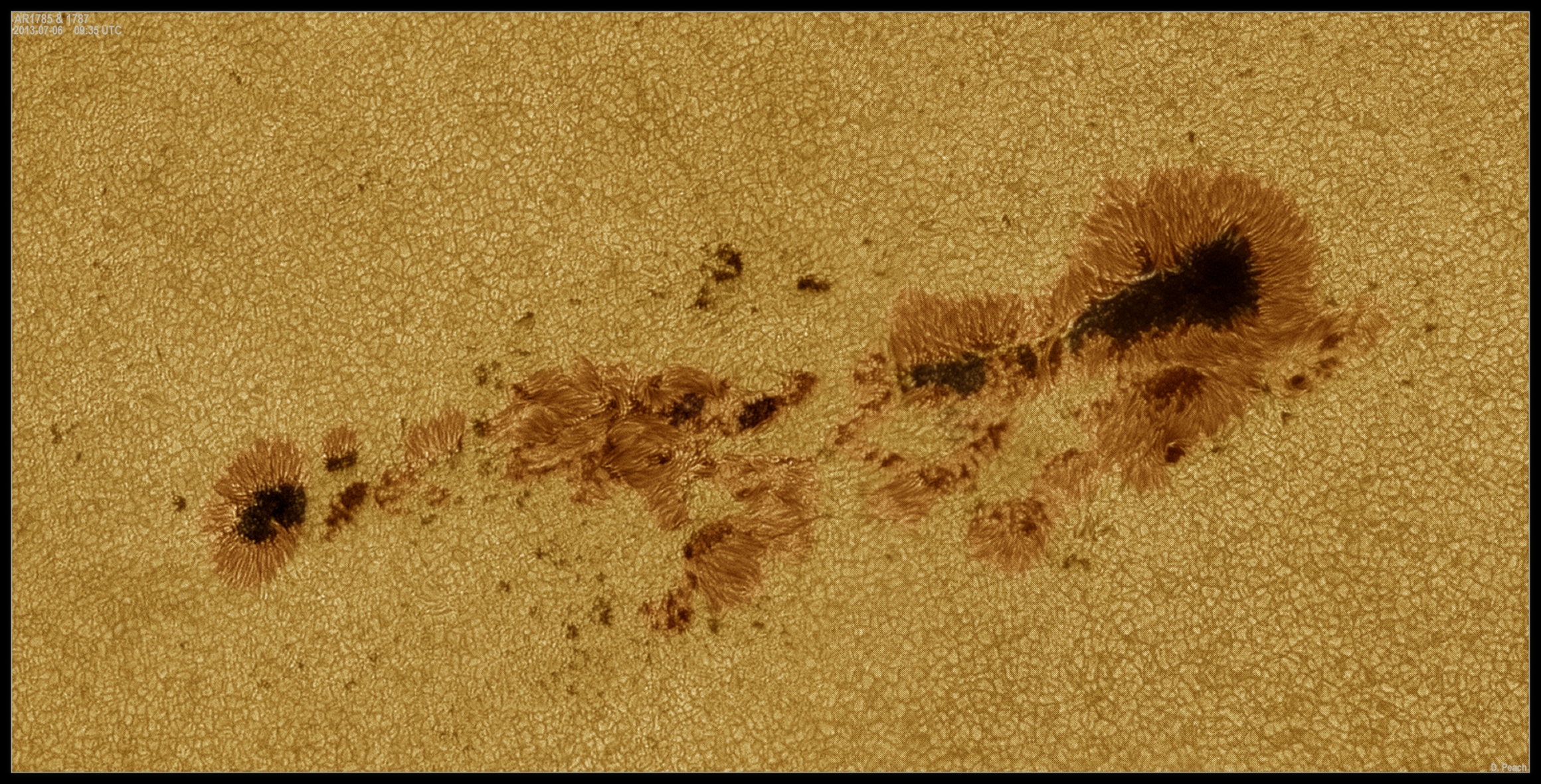 APOD: 2013 July 10 – Large Sunspots Now Crossing the Sun