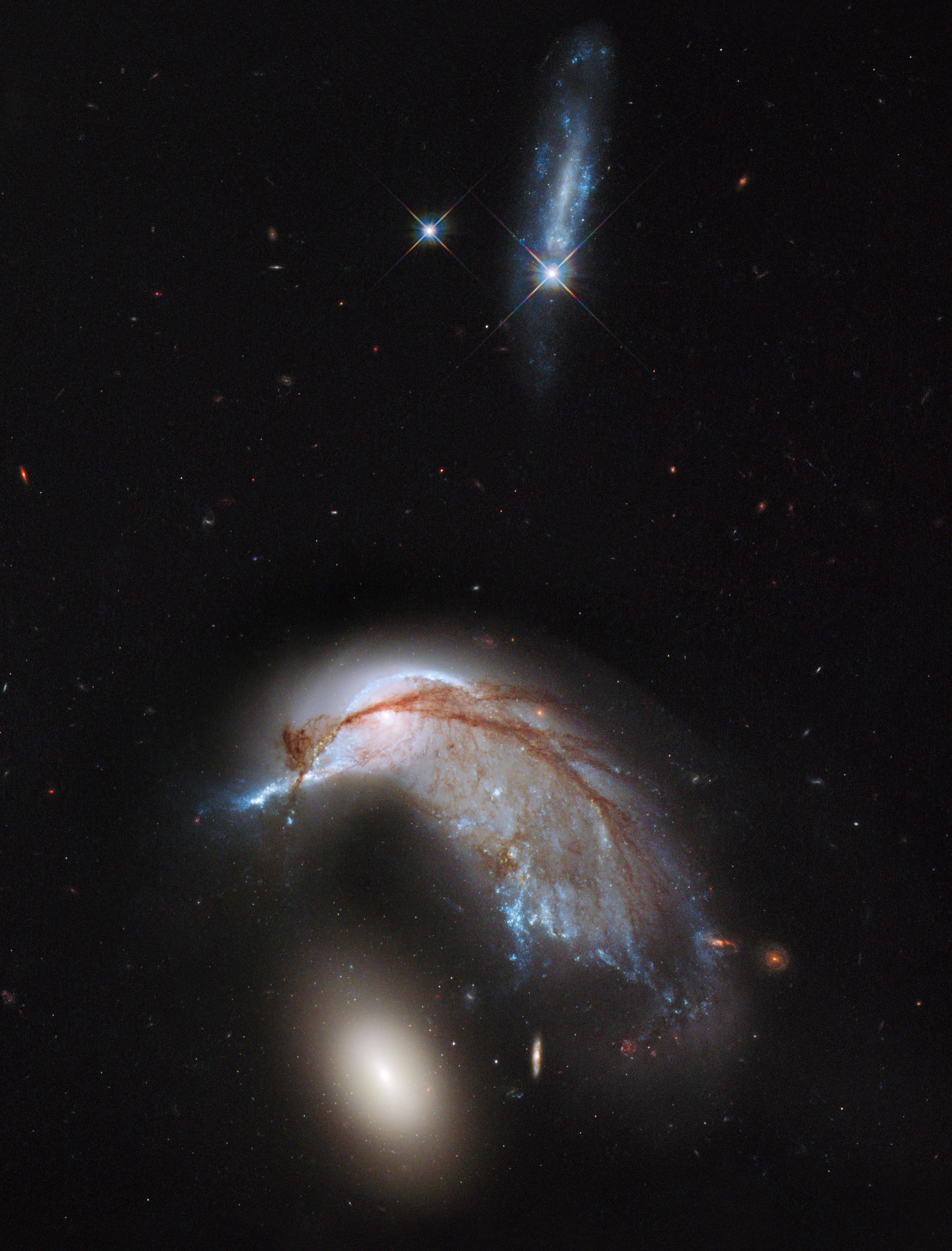 APOD: 2013 June 24 – The Porpoise Galaxy from Hubble