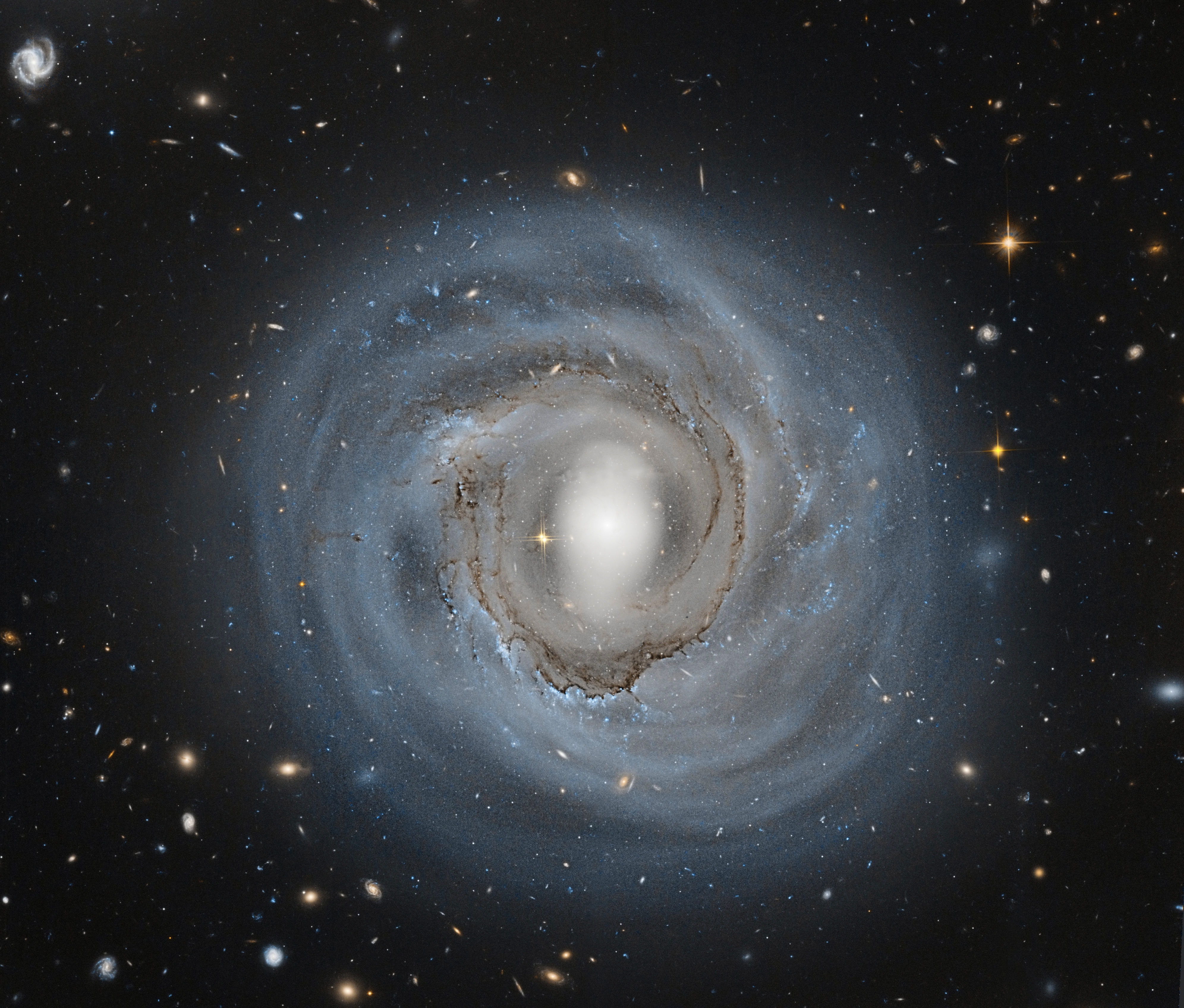 APOD: 2013 November 25 – Anemic Spiral NGC 4921 from Hubble