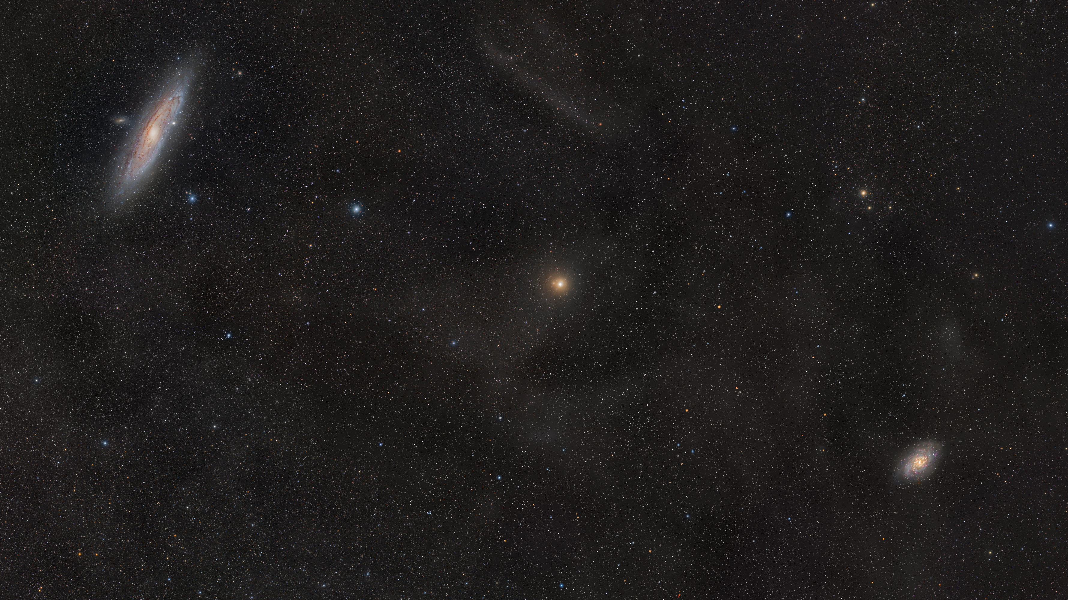 APOD: 2013 September 26 – M31 versus M33