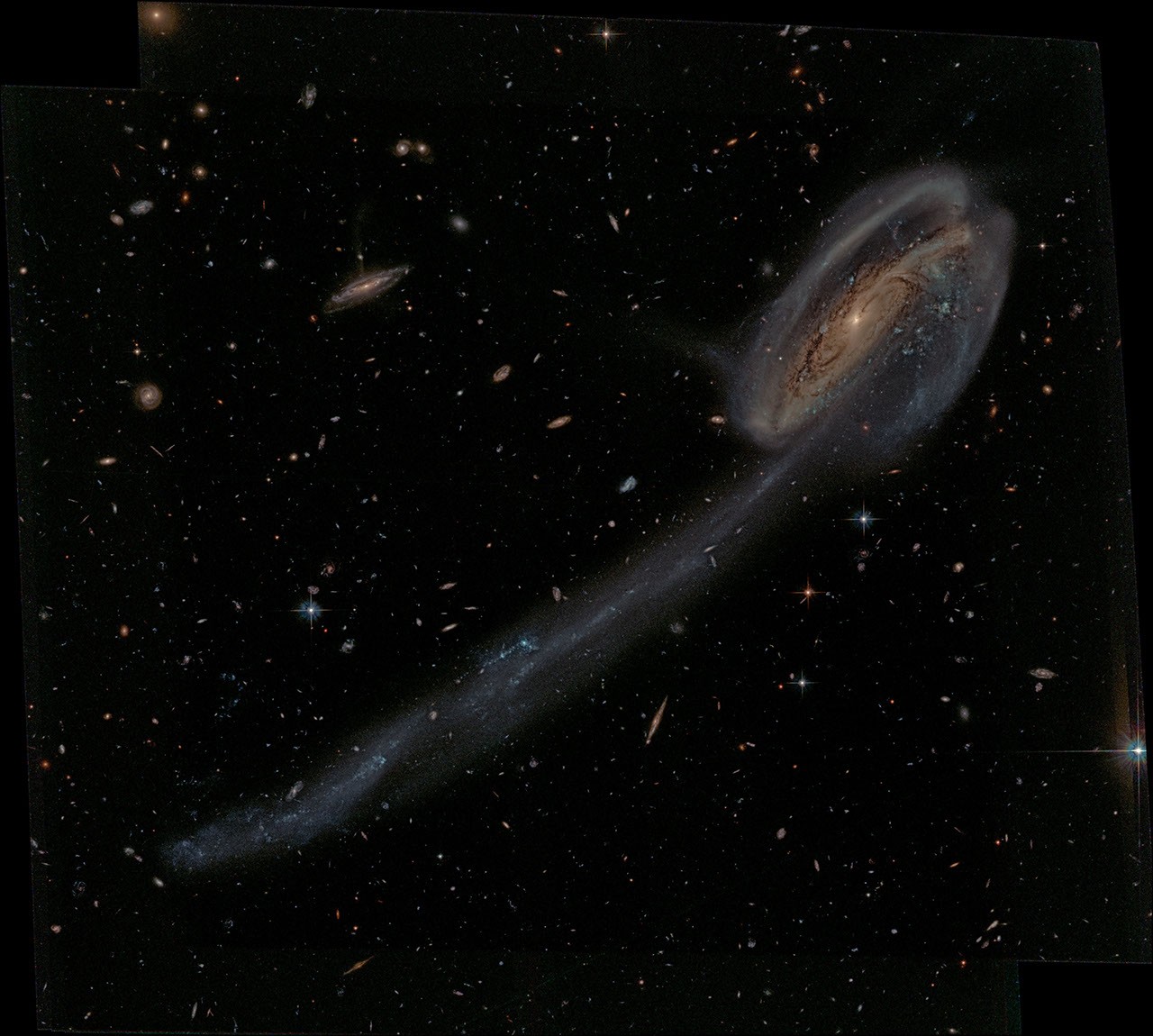 Arp 188 and the Tadpole's Tail — APOD for 2014-08-25