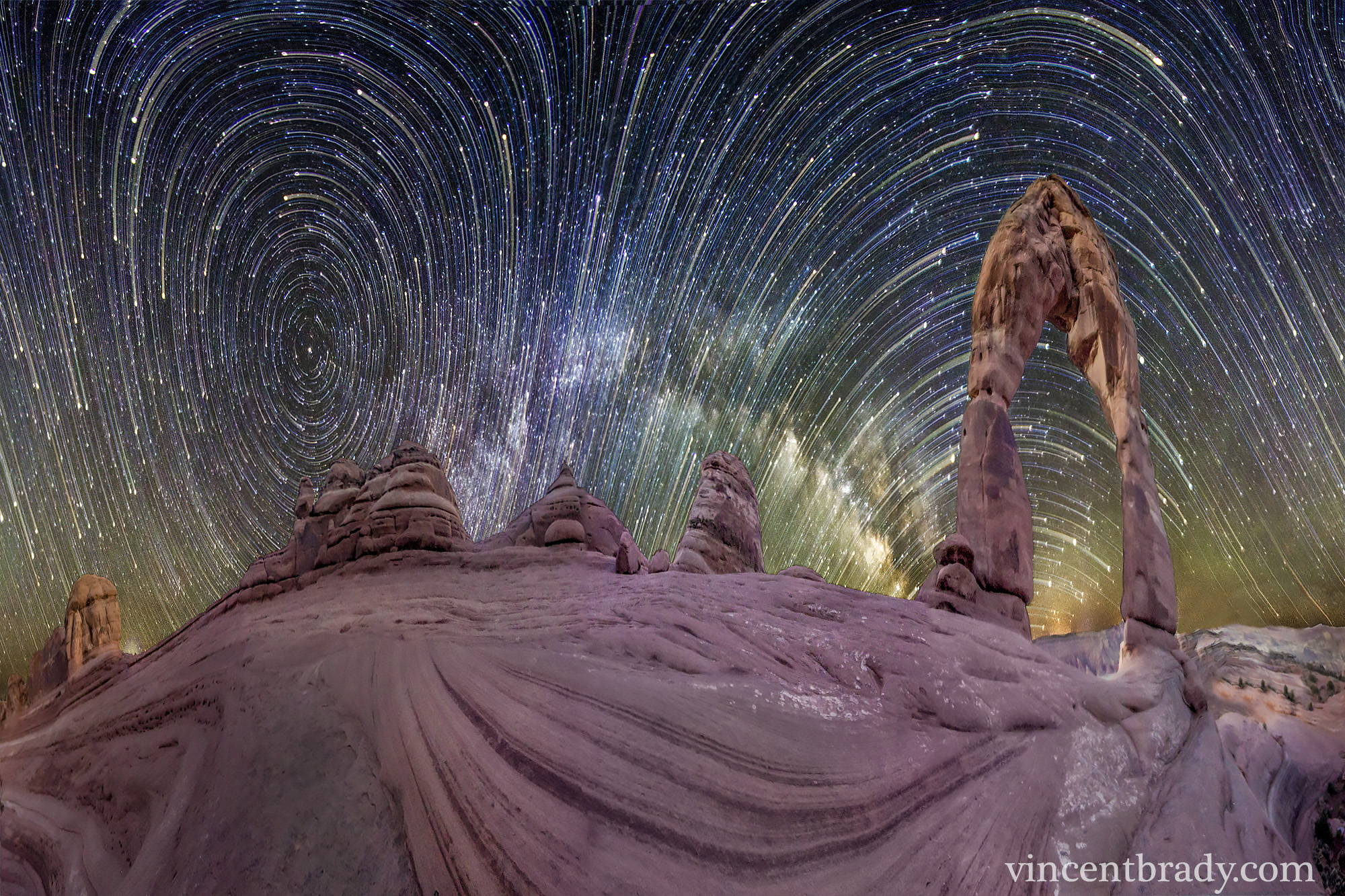 APOD: 2014 March 17 – Warped Sky: Star Trails over Arches National Park