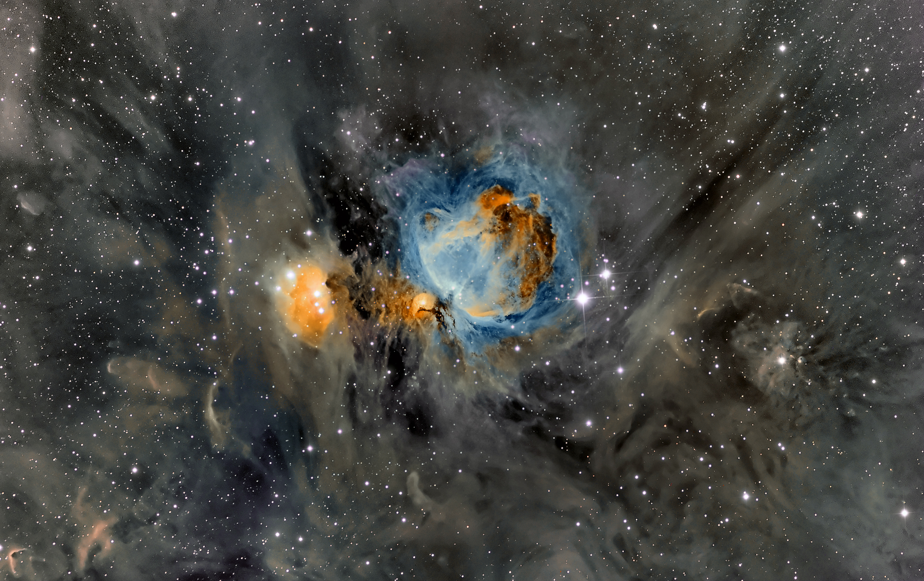 APOD: 2014 March 25 – Orion Nebula in Surrounding Dust