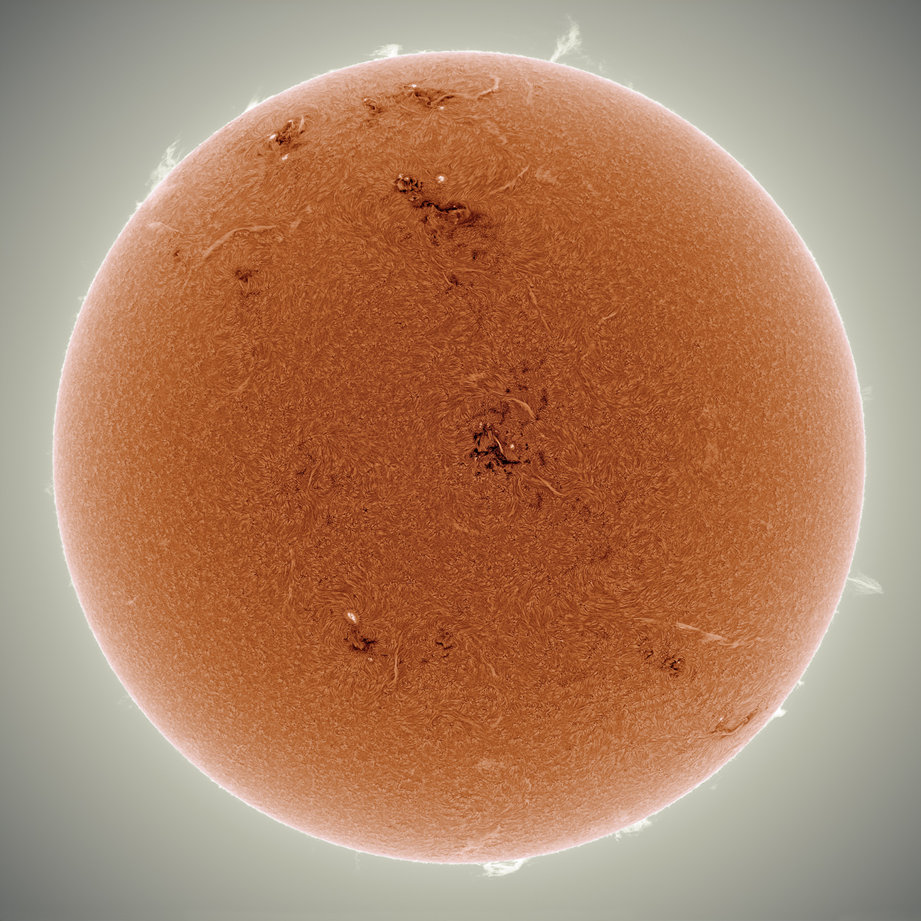 APOD: 2014 May 6 – Orange Sun Sparking