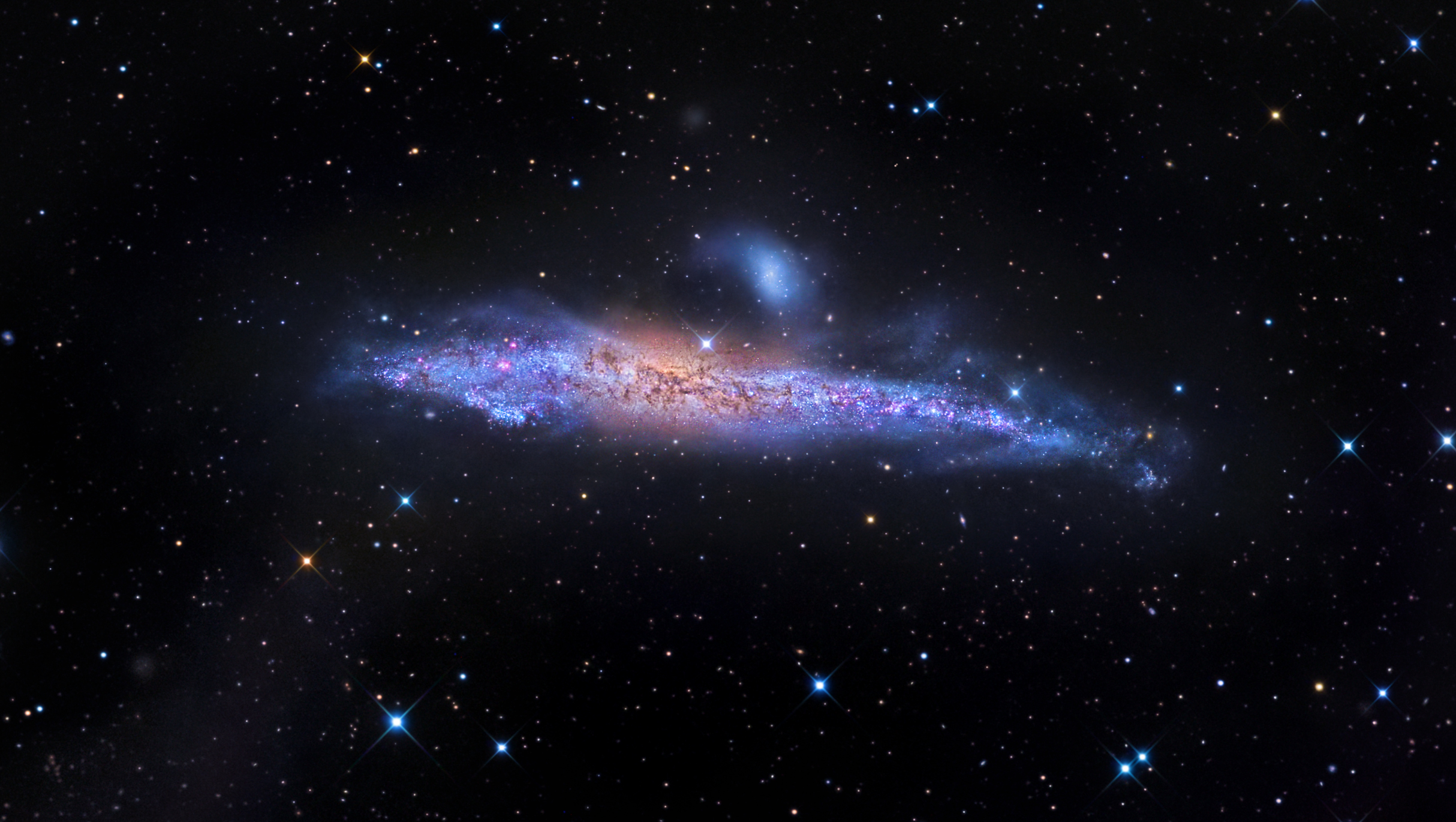 APOD: 2015 December 19 – Star Streams and the Whale Galaxy