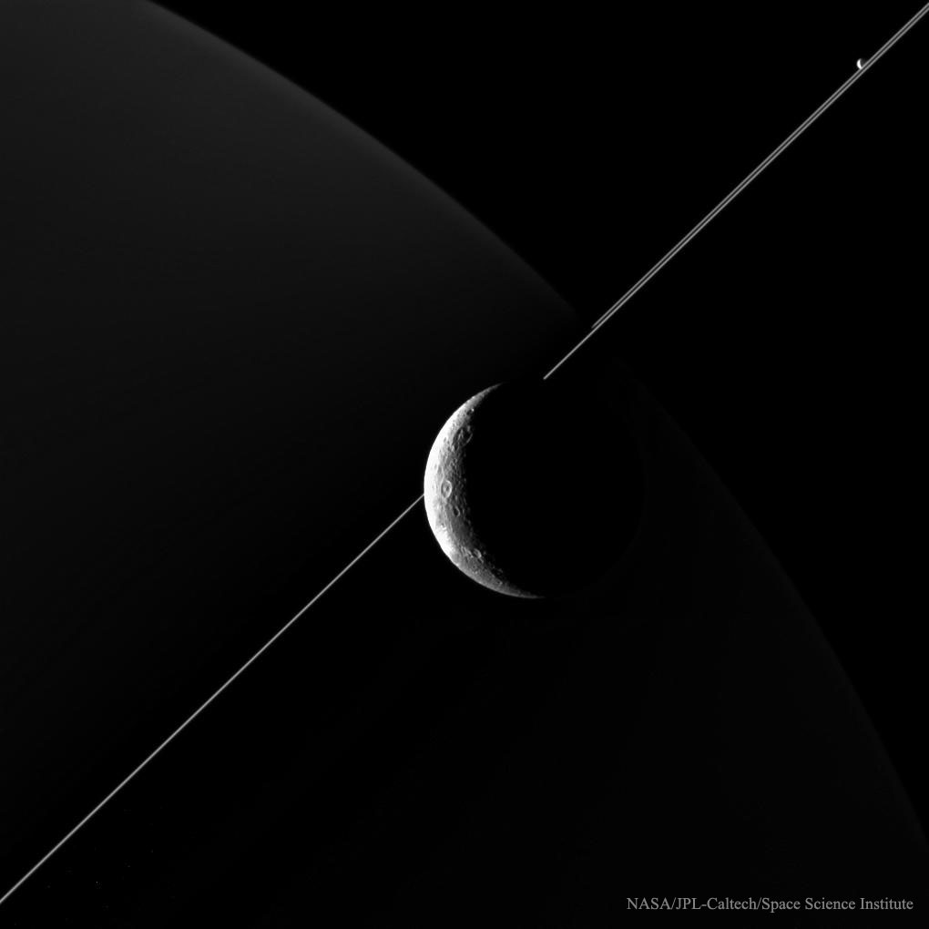 APOD: 2015 July 8 – In the Company of Dione