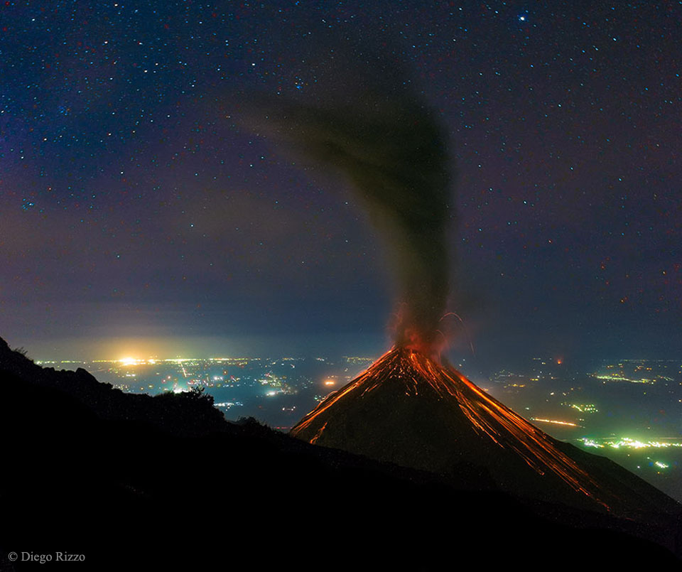 APOD: 2015 March 11 – Volcano of Fire Erupts Under the Stars