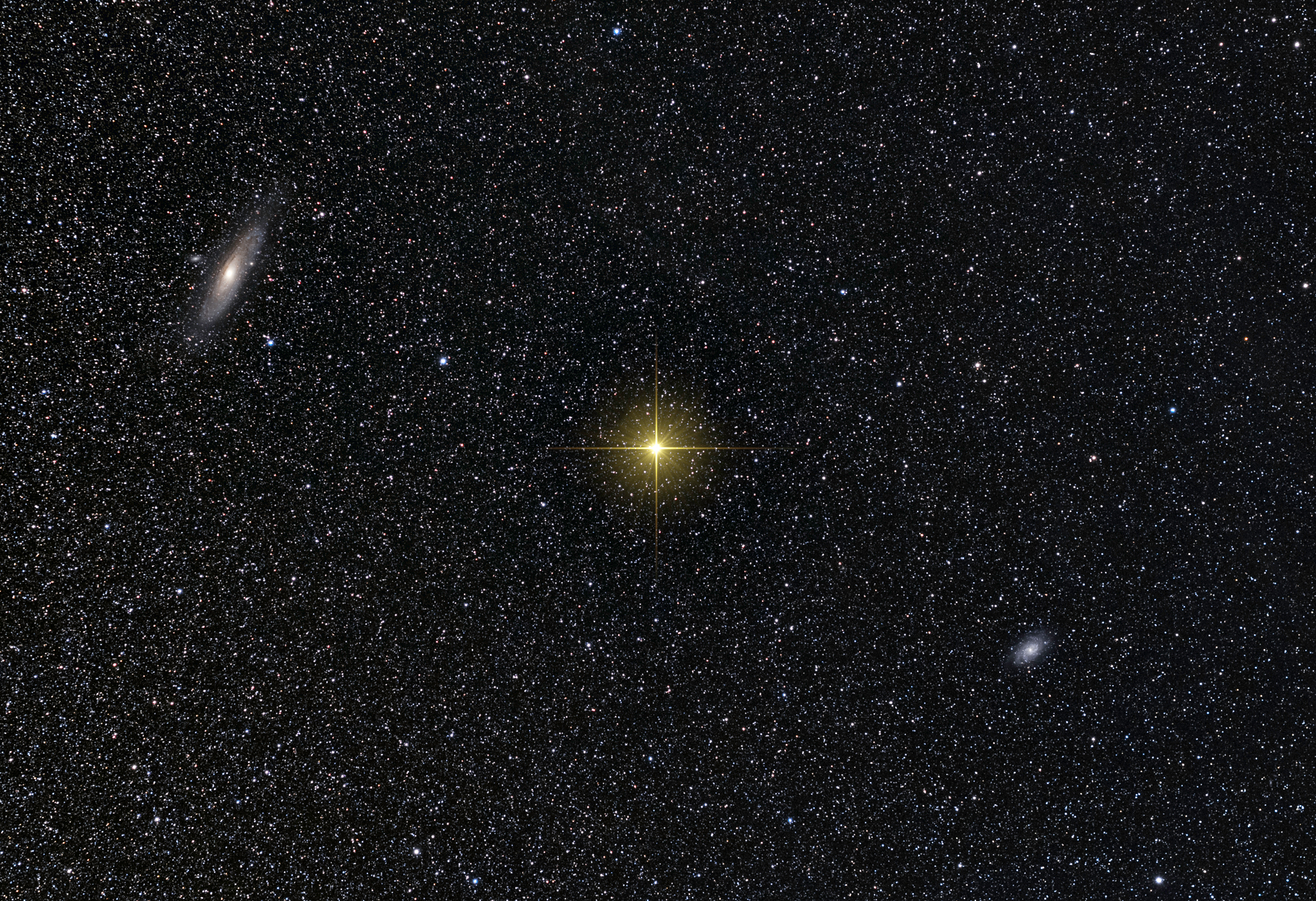 APOD: 2015 September 26 – M31 versus M33