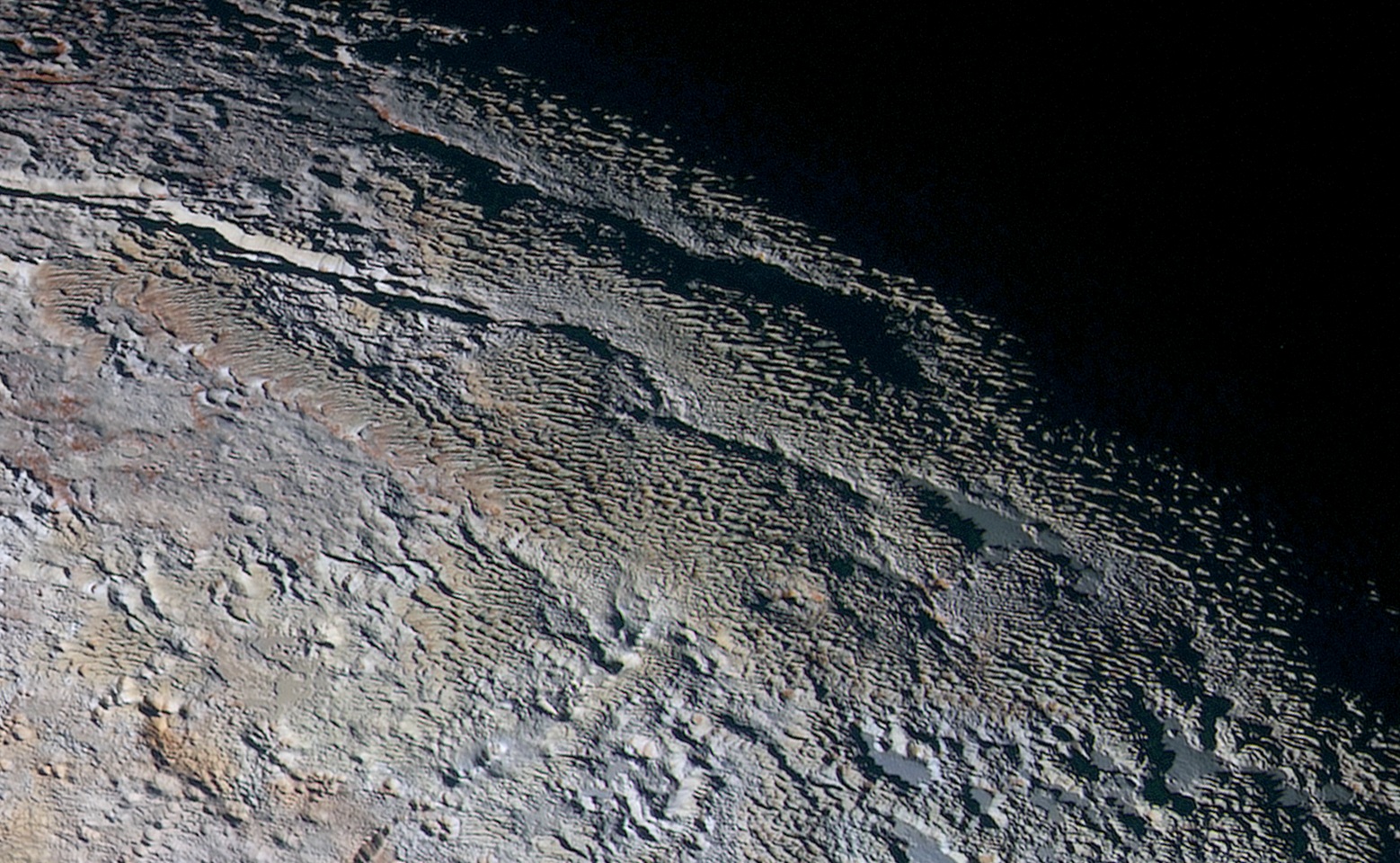 APOD: 2015 September 25 – Pluto’s Snakeskin Terrain