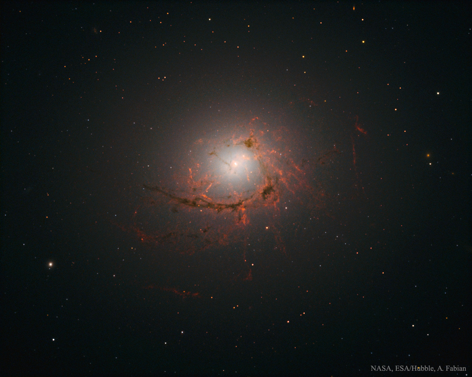 APOD: 2016 December 7 – NGC 4696: Filaments around a Black Hole