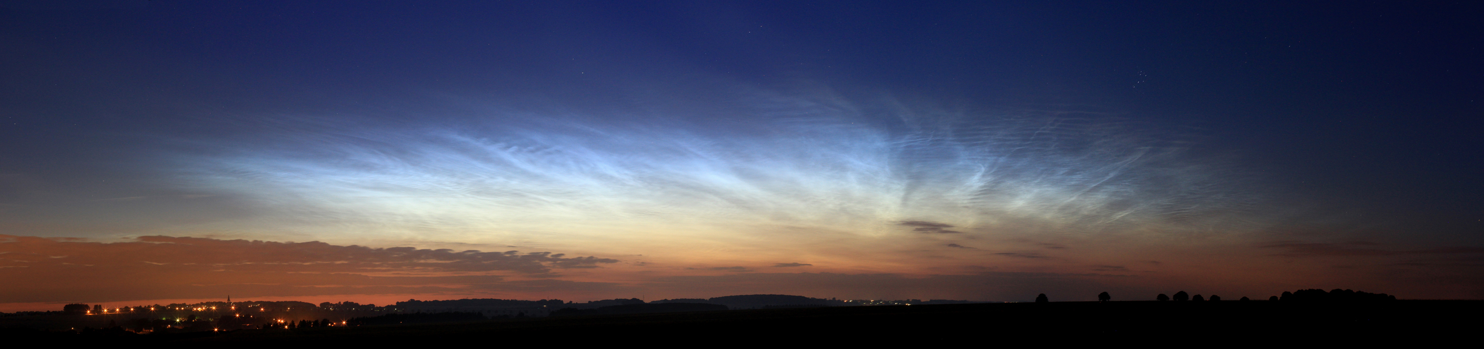 APOD: 2016 July 9 – Noctilucent Clouds Tour France