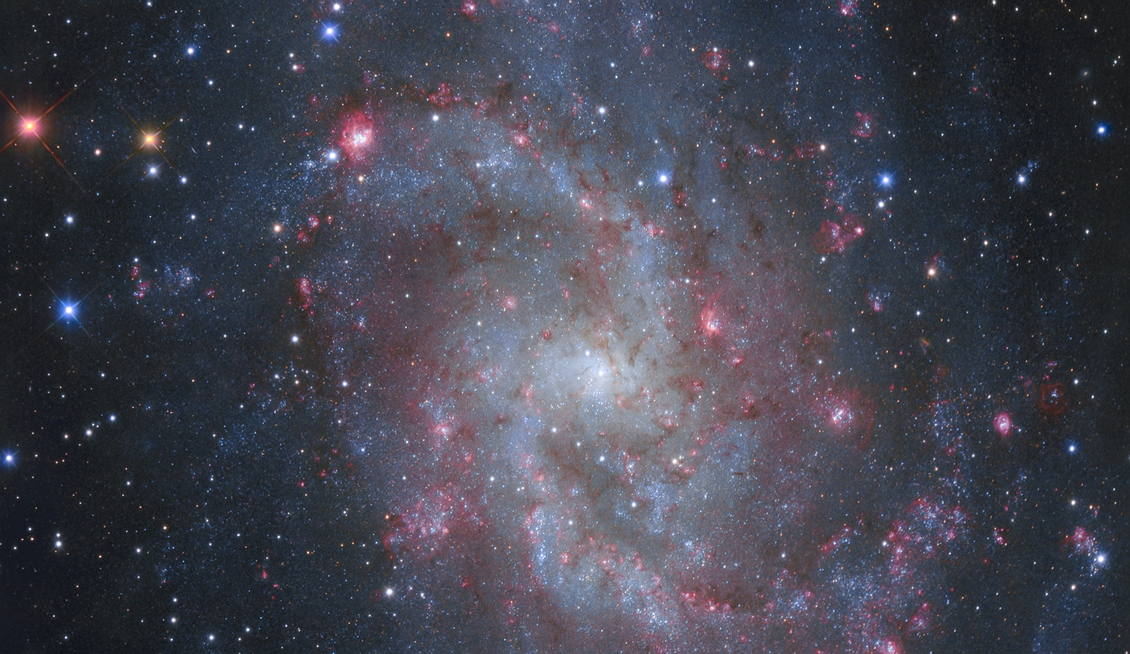 APOD: 2016 October 7 – The Hydrogen Clouds of M33