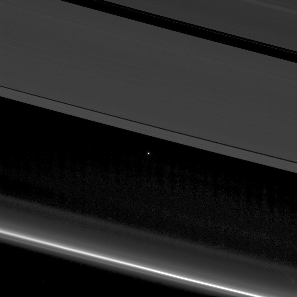 APOD: 2017 April 22 – Between the Rings