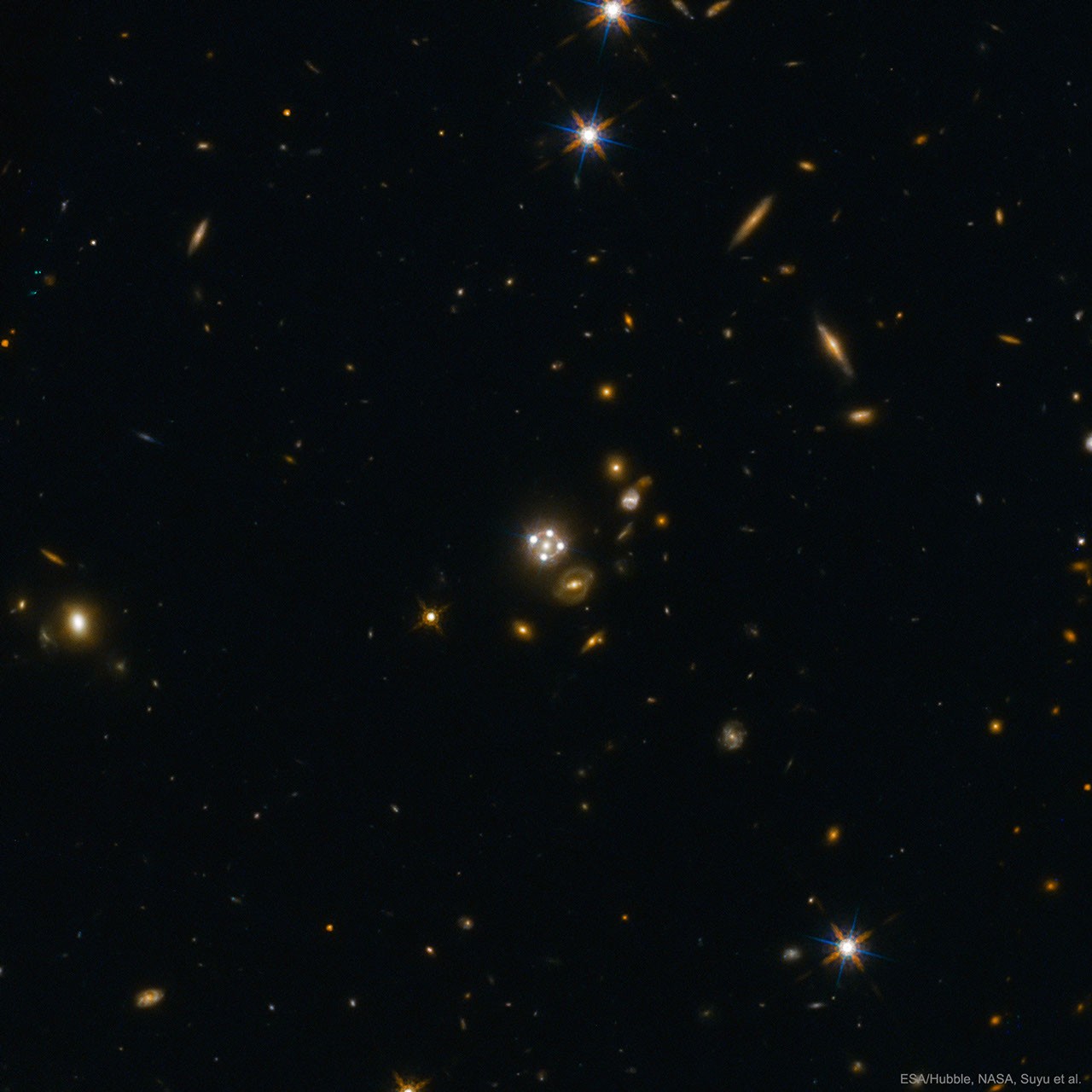 Four Quasar Images Surround a Galaxy Lens — APOD for 2017-02-27