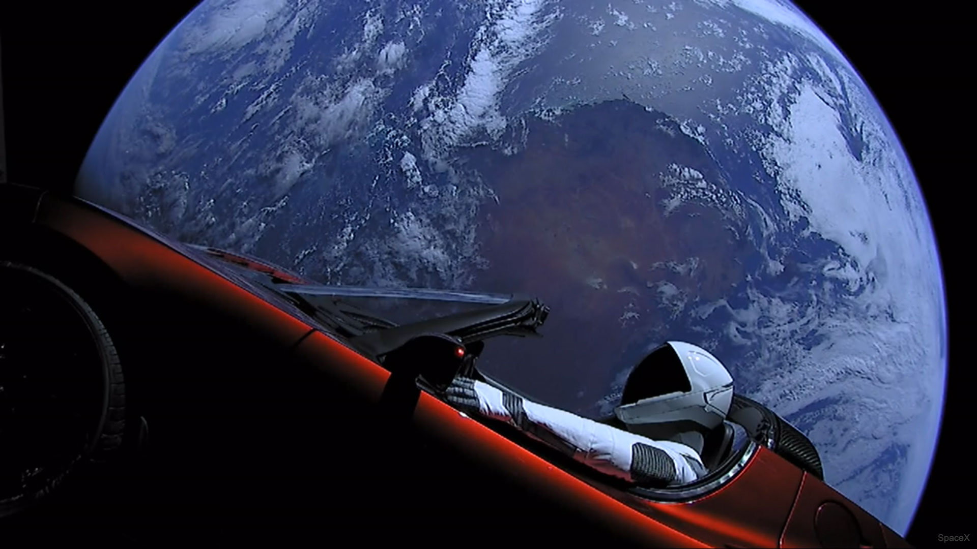 APOD: 2018 February 13 – Car Orbiting Earth