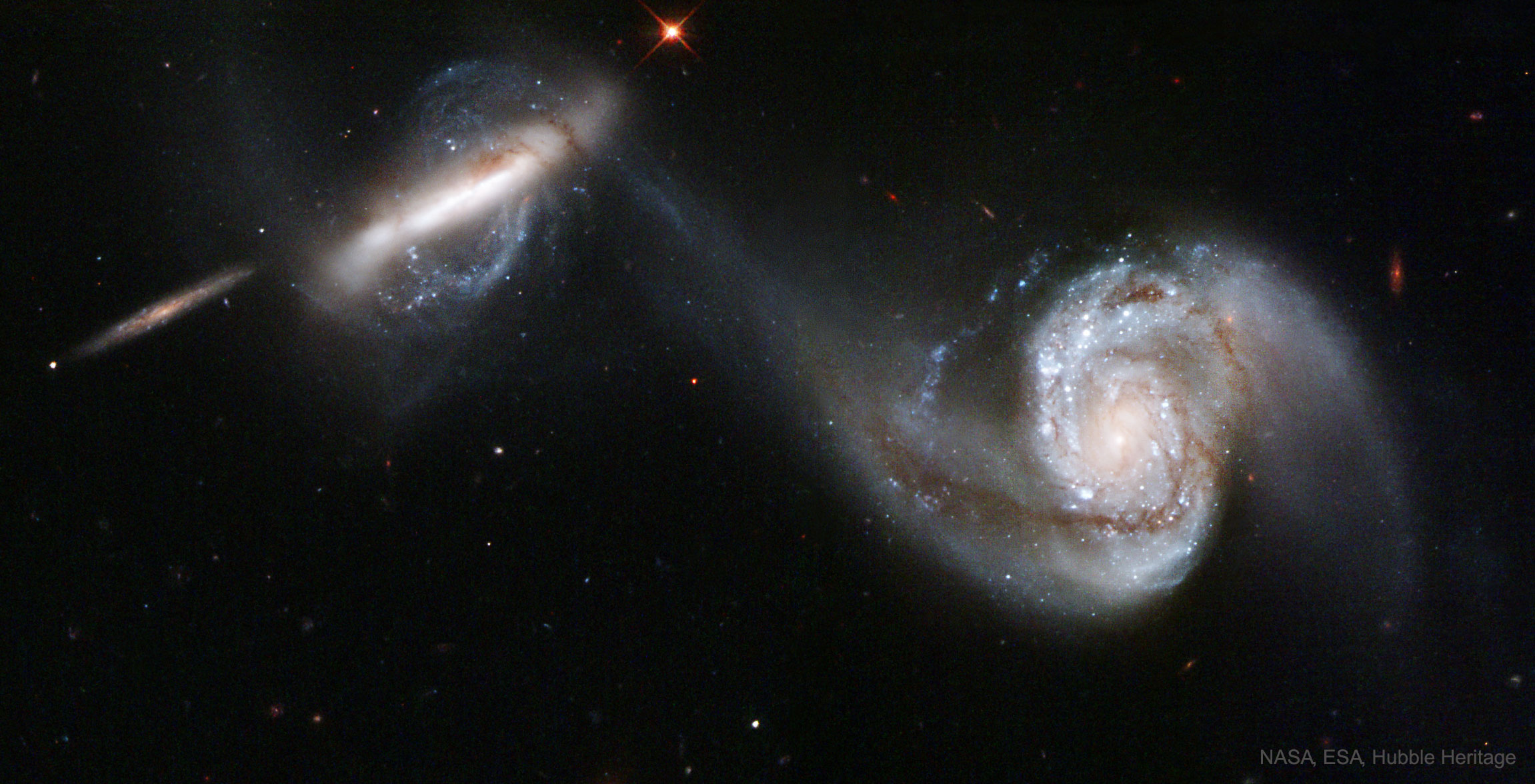 APOD: 2019 August 11 – Arp 87: Merging Galaxies from Hubble