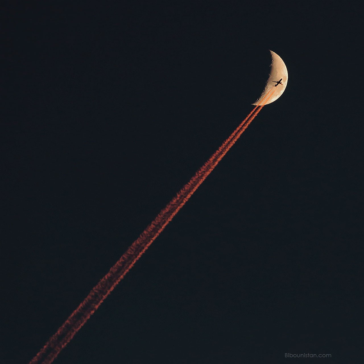 Plane Crossing a Crescent Moon — APOD for 2019-02-12