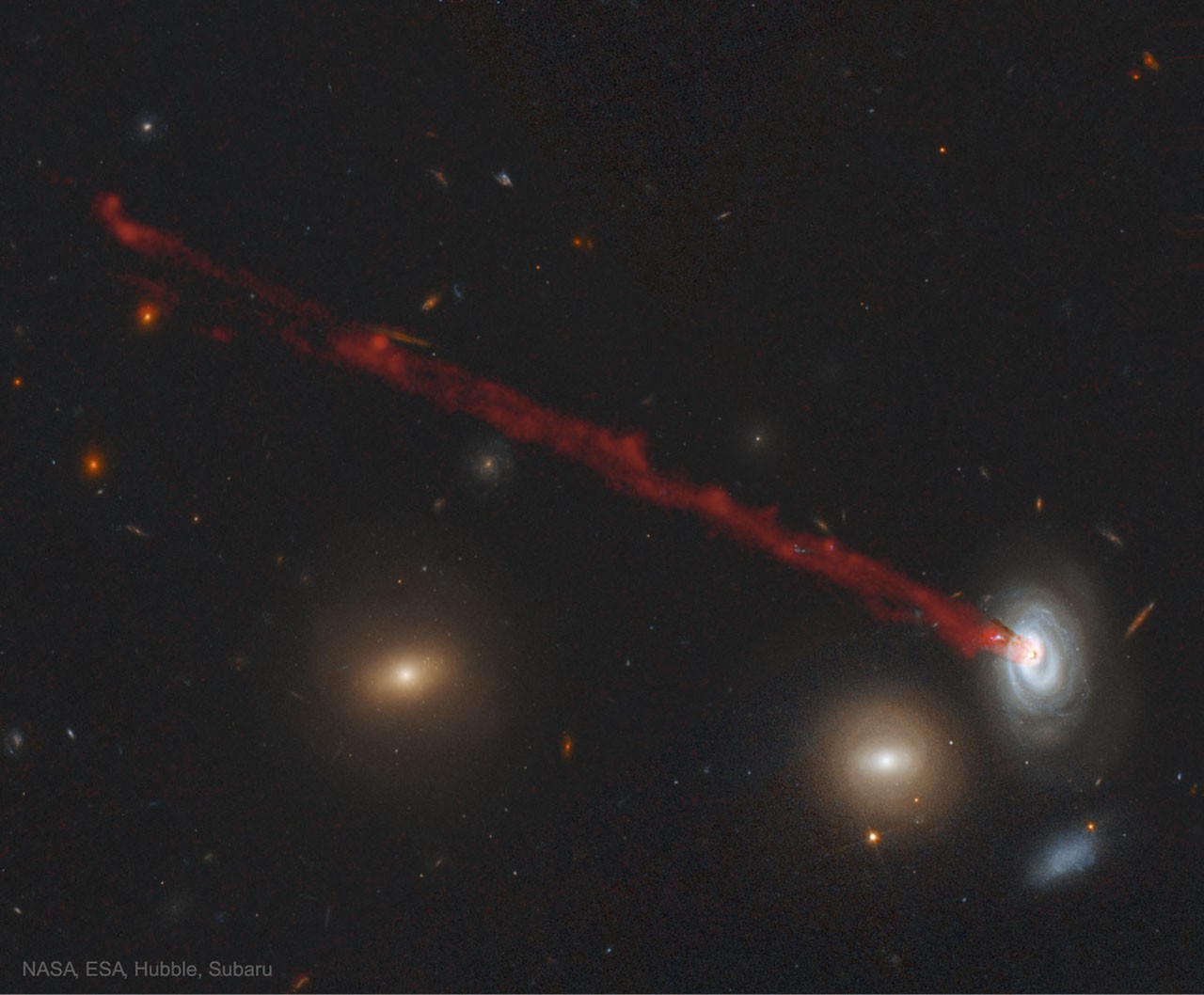 The Long Gas Tail of Spiral Galaxy D100 — APOD for 2019-01-28