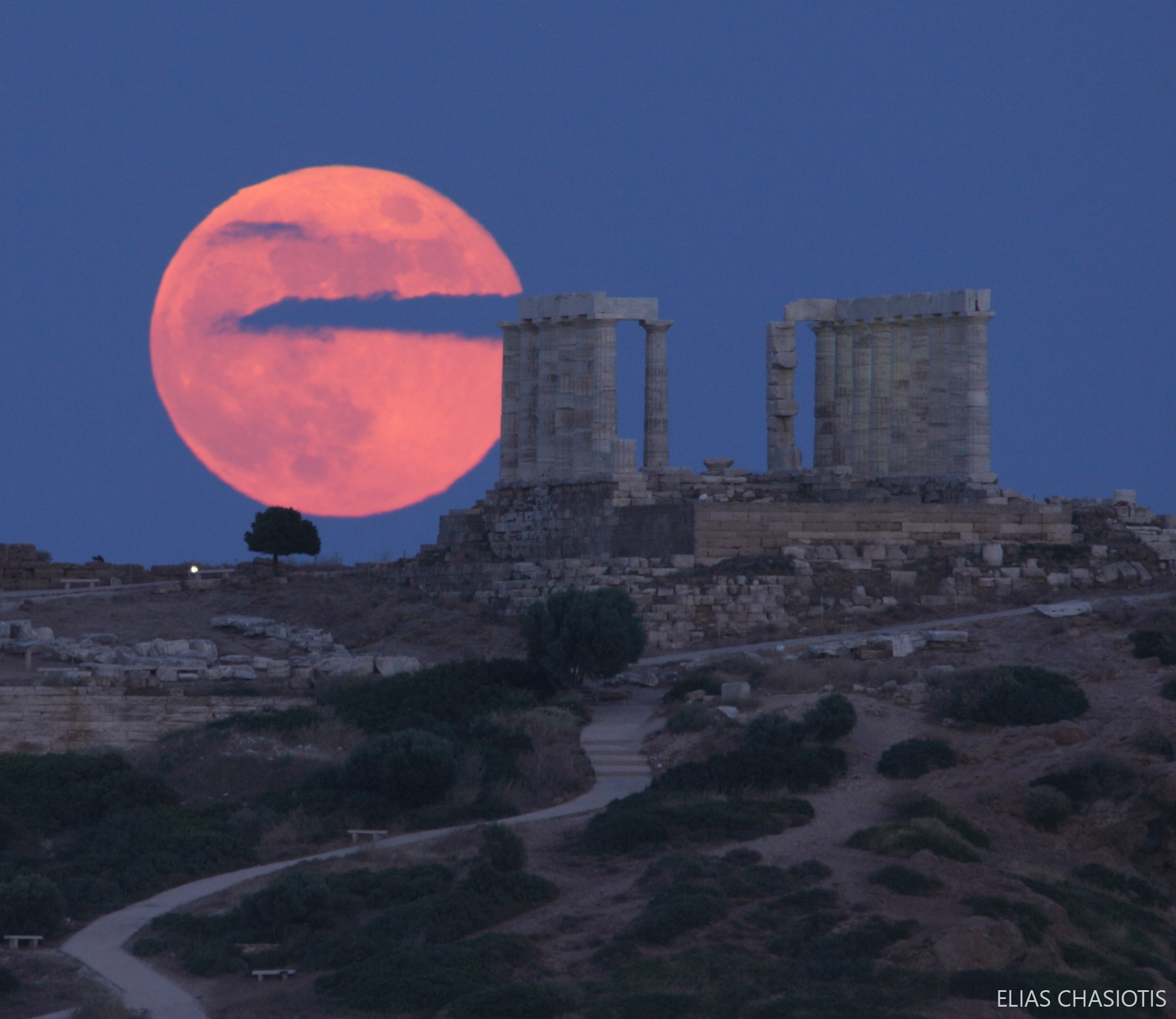 APOD: 2019 June 18 – Strawberry Moon over the Temple of Poseidon