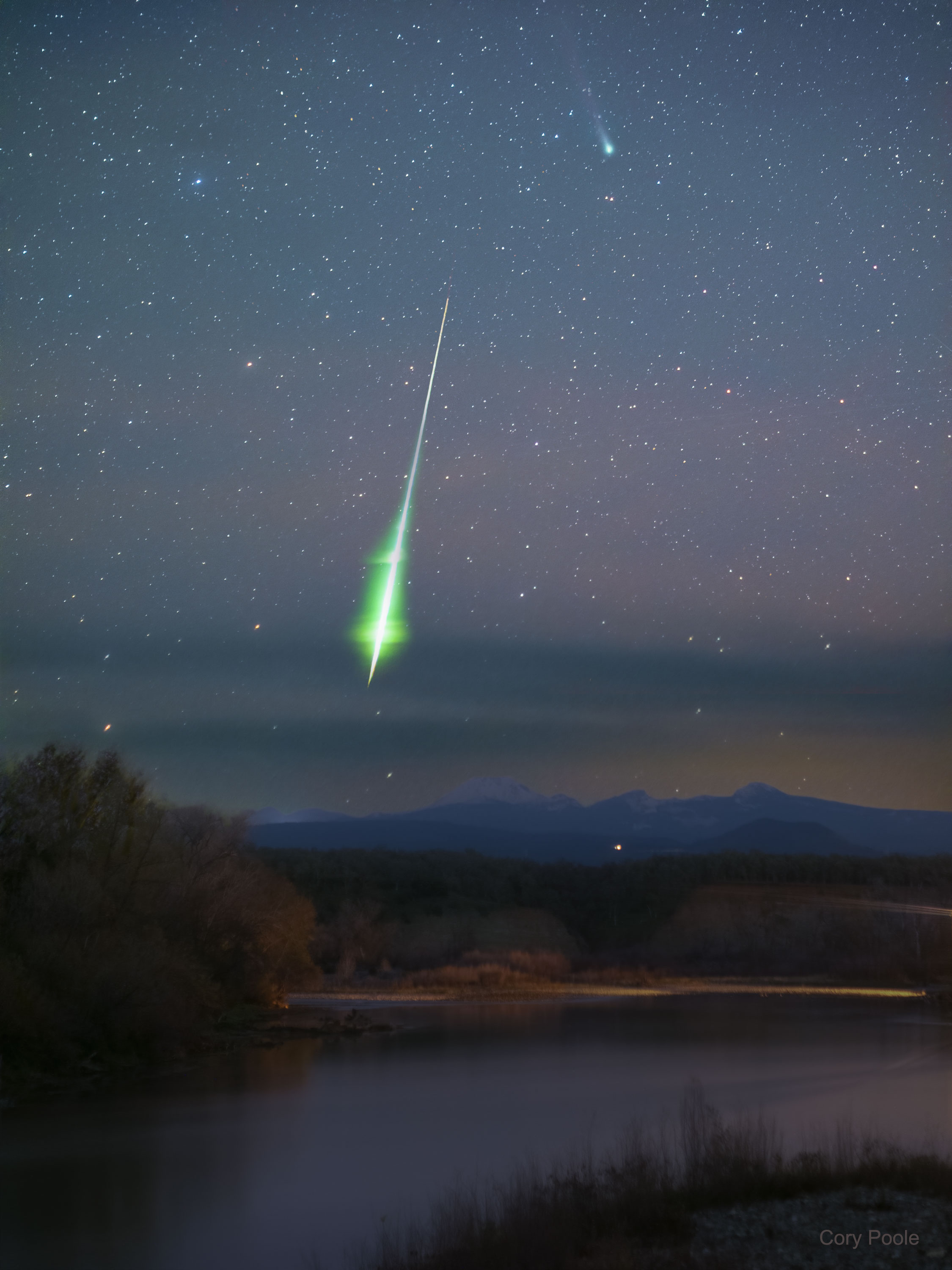 The featured image shows Comet Leonard in the backround with a bright green fireball meteor in the foreground. The image was taken from northern California, USA. Please see the explanation for more detailed information.