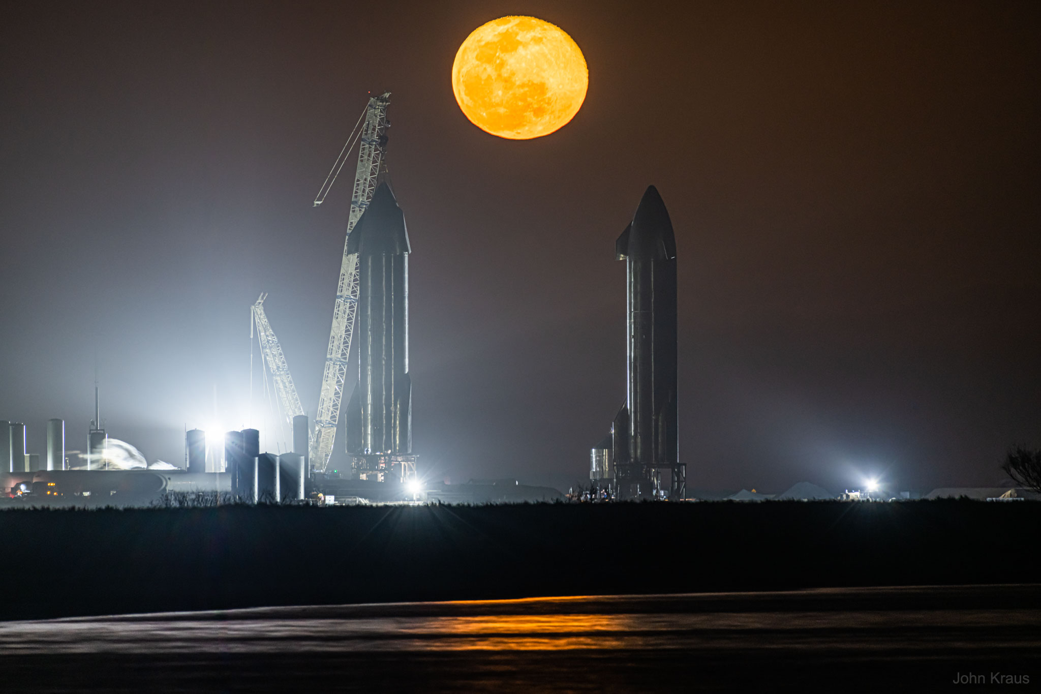 APOD: 2021 February 22 – Moon Rising Between Starships