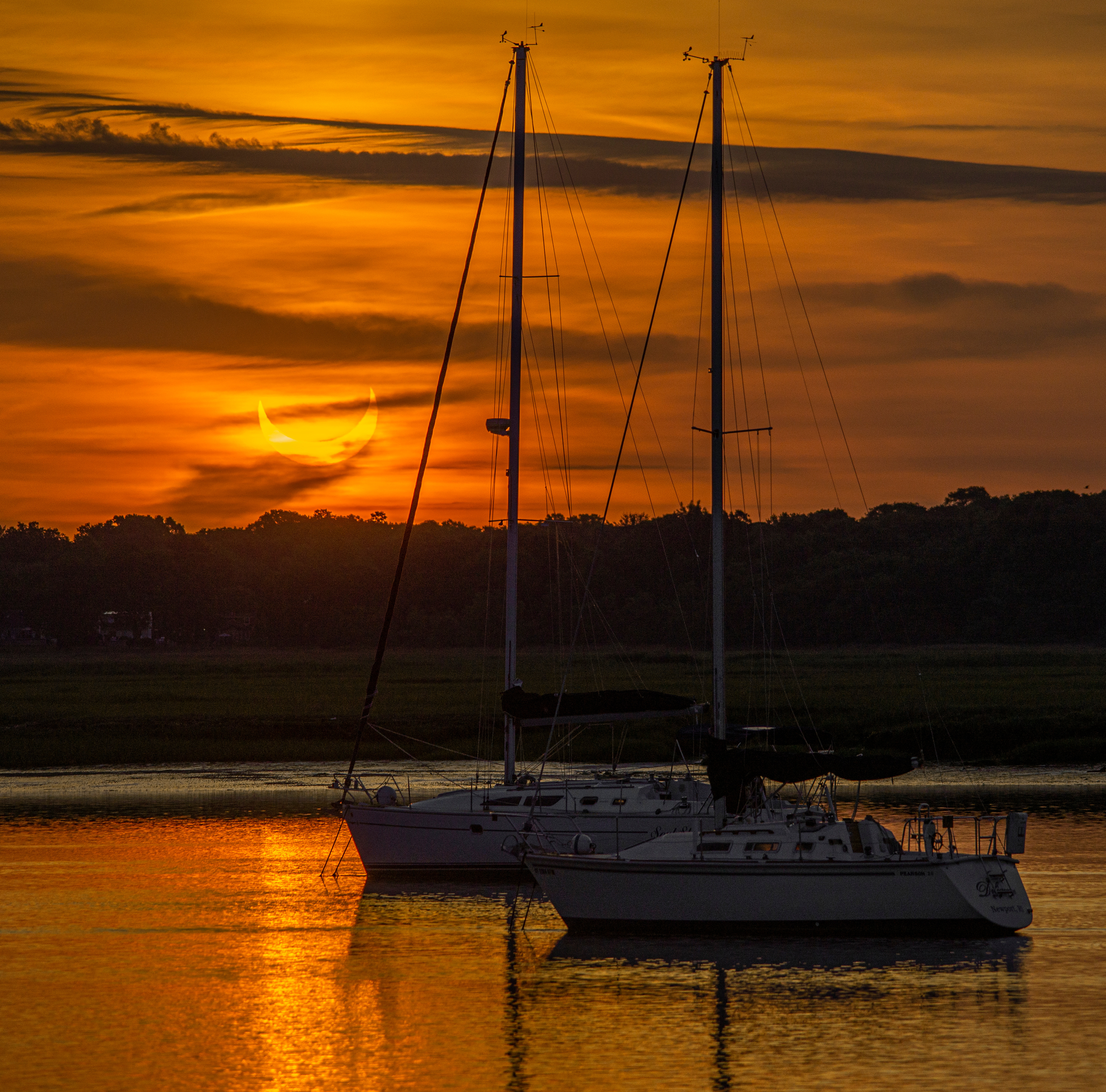 APOD: 2021 June 12 – Eclipse on the Water