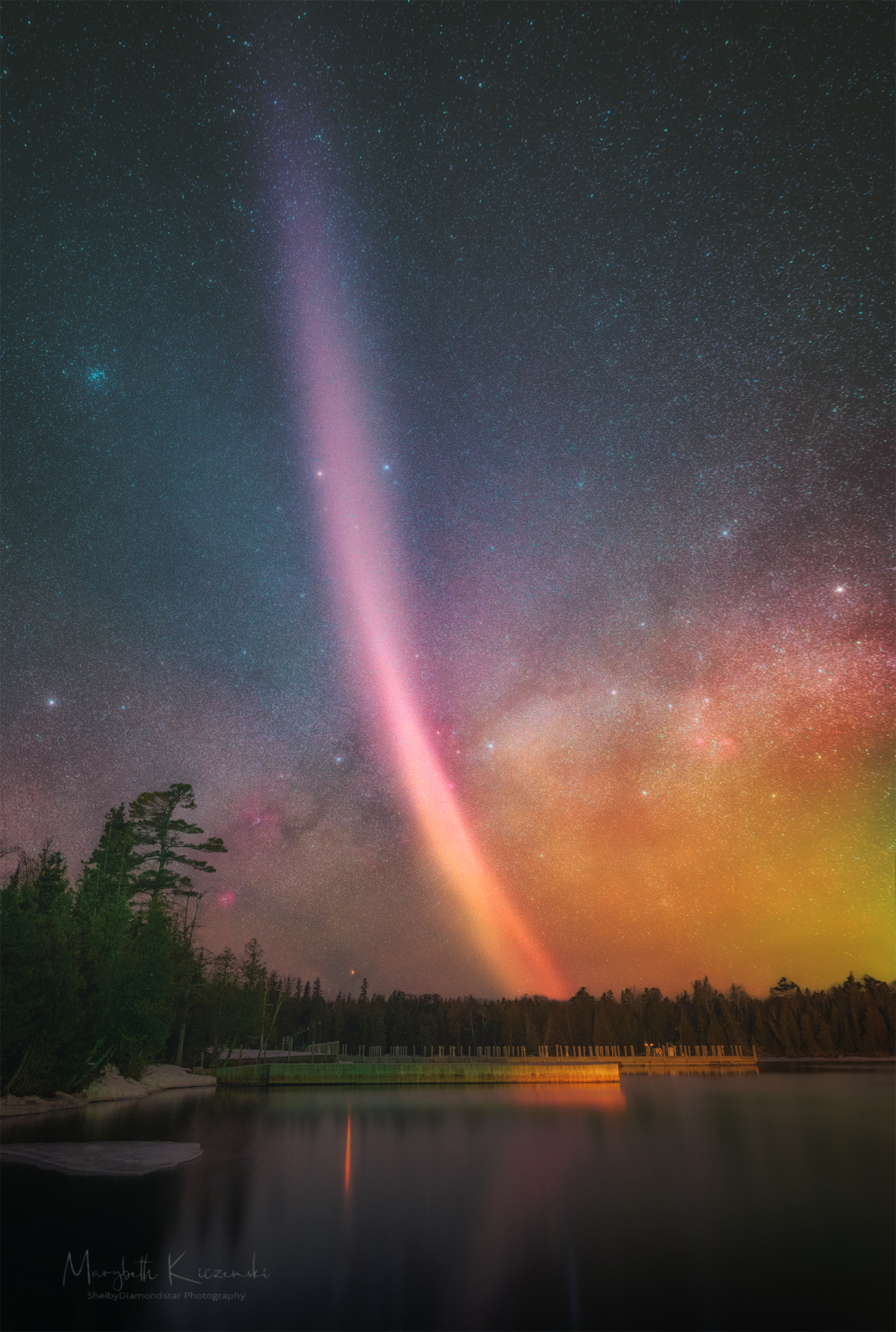 A picture of a STEVE arc over Copper Harbor, Michigan, with the Milky Way across the background. Please see the explanation for more detailed information.