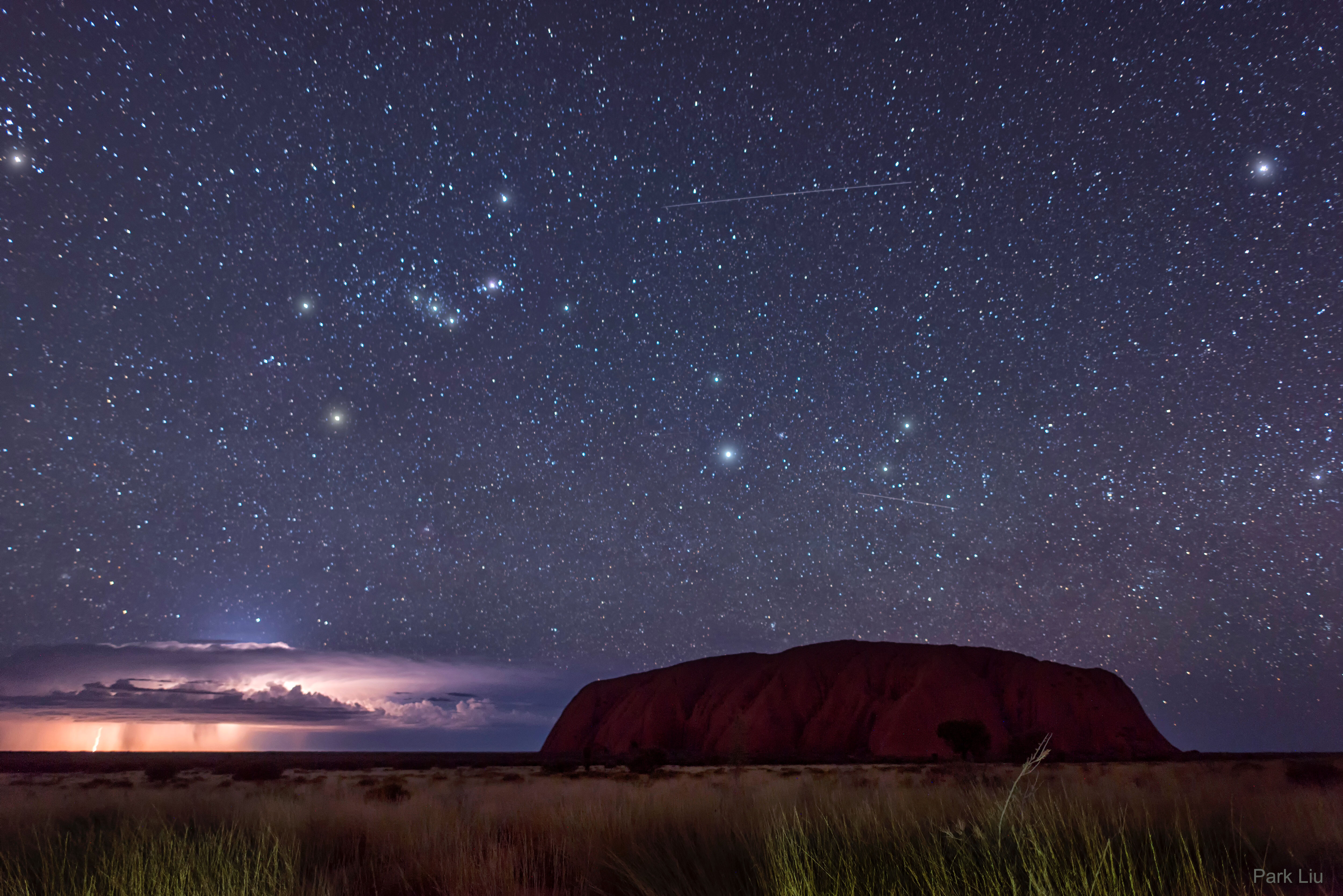 APOD: 2021 May 11 – Lightning and Orion Beyond Uluru