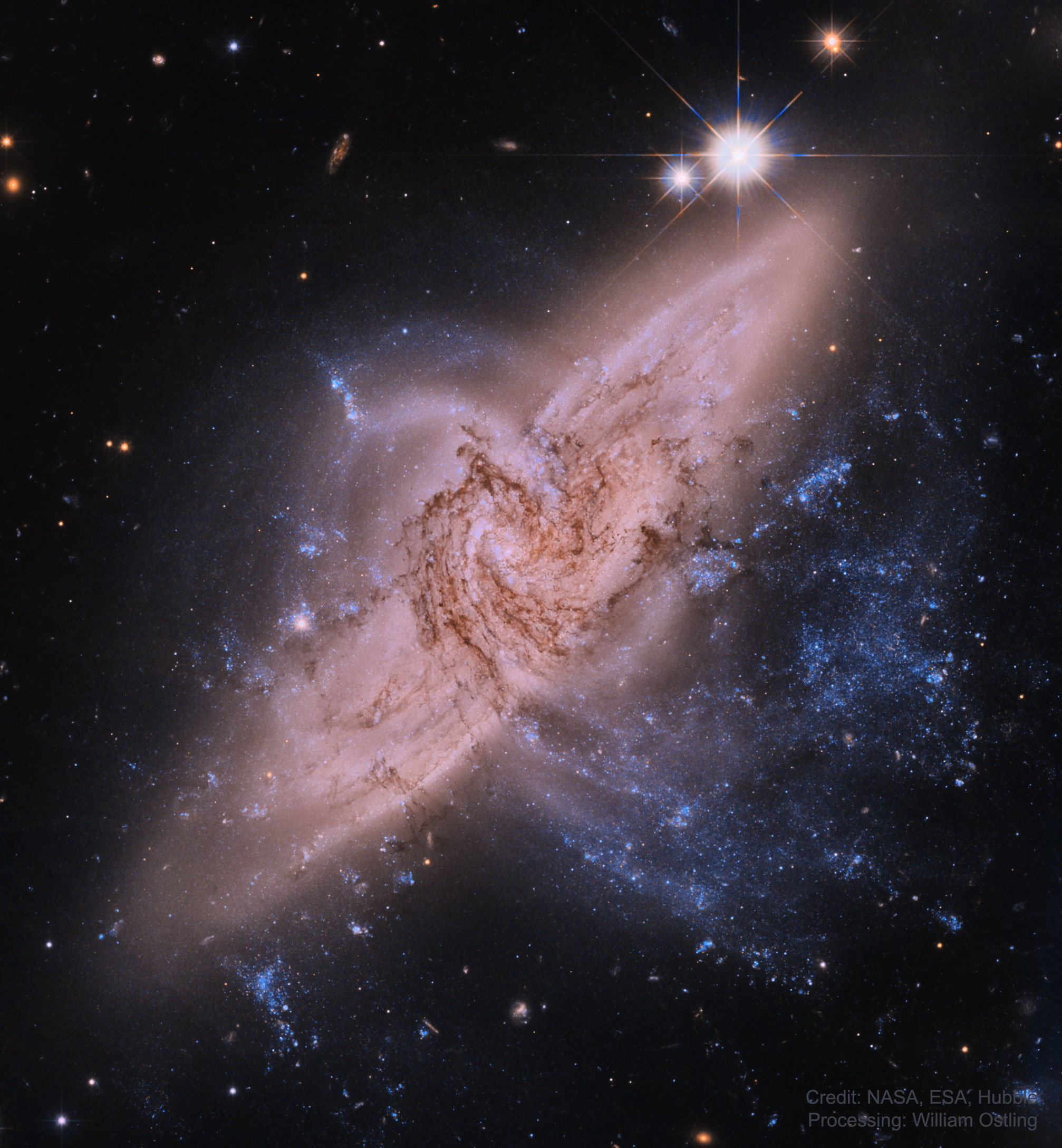 APOD: 2021 November 17 – NGC 3314: When Galaxies Overlap