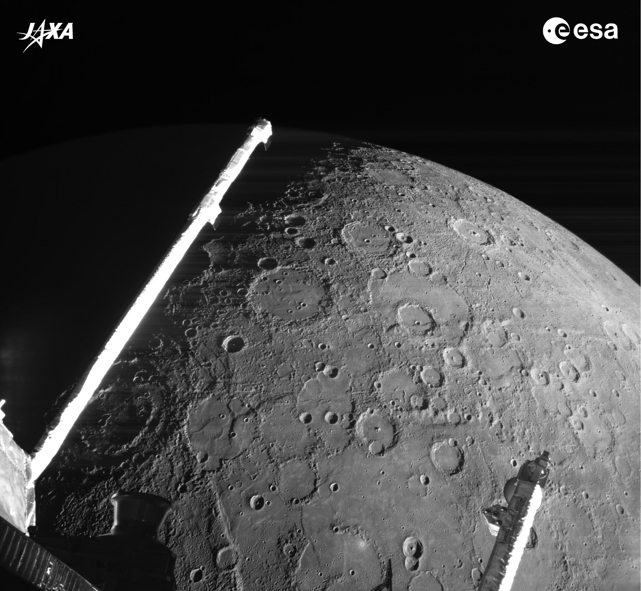 The featured image shows the heavily cratered surface of Mercury with parts of ESA's and JAXA's passing robotic BepiColombo in the foreground. Please see the explanation for more detailed information.