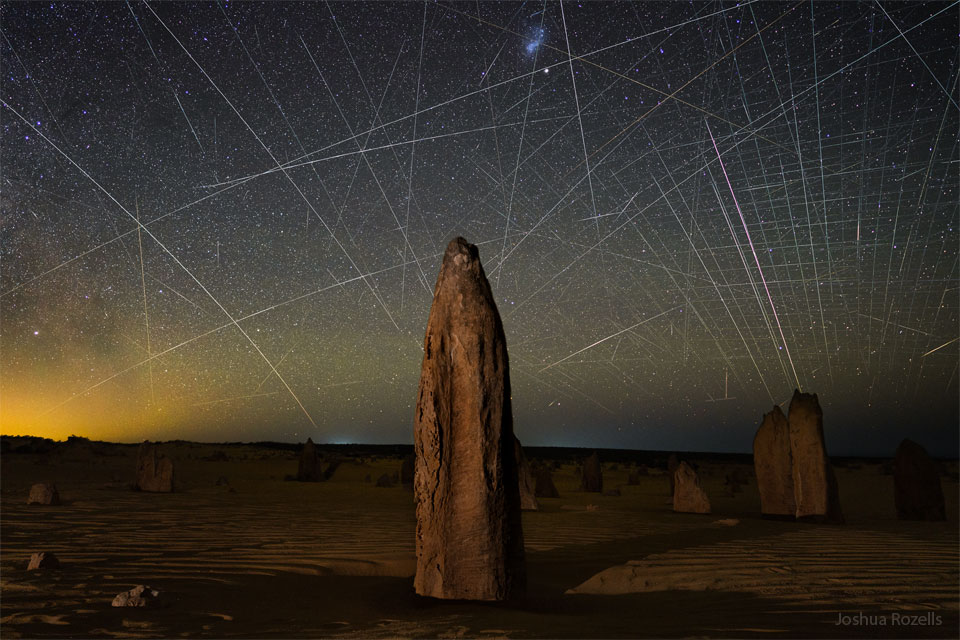 APOD: 2022 June 14 – Satellites Behind Pinnacles