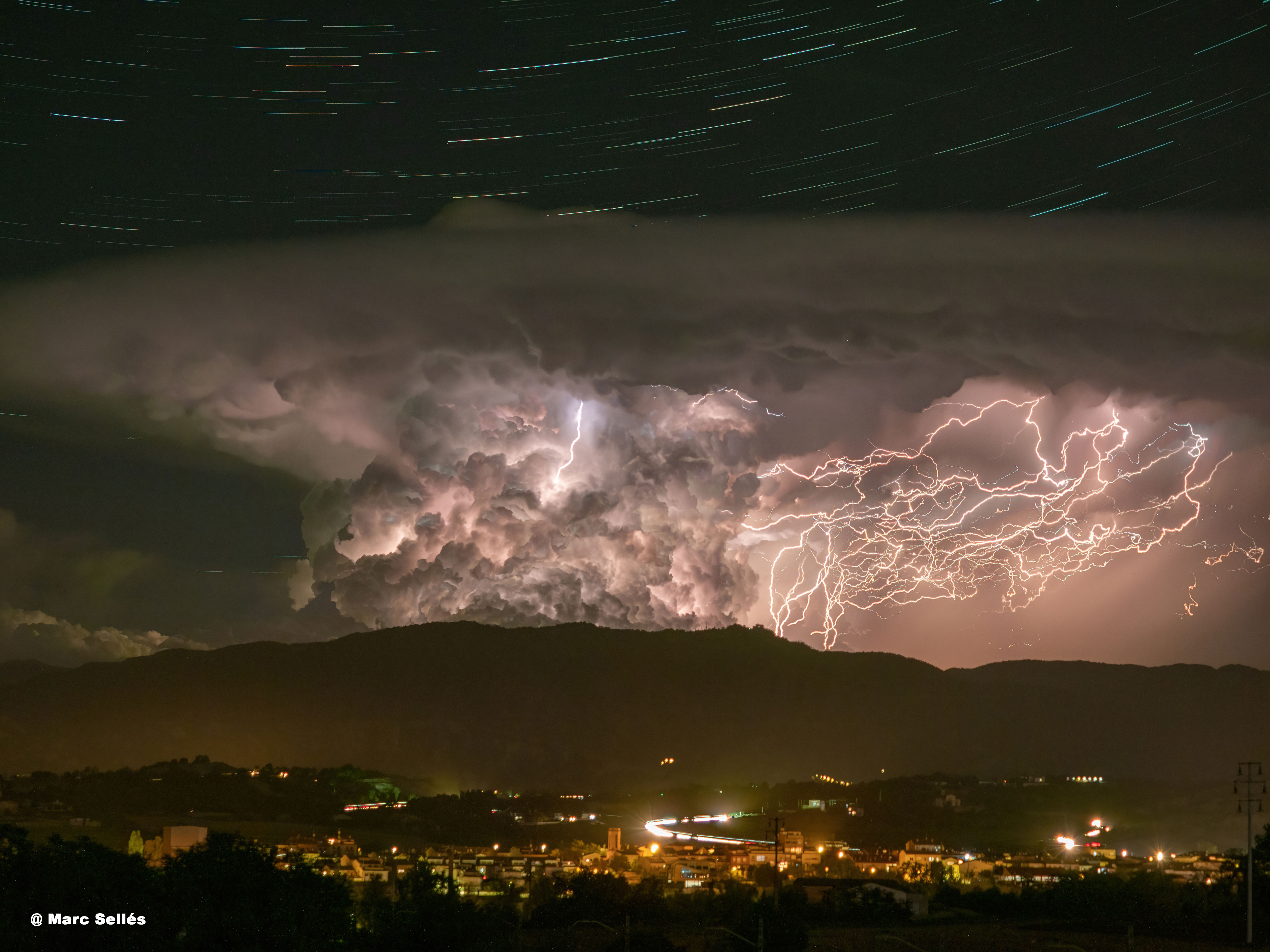 APOD: 2022 September 19 – Star Trails and Lightning over the Pyrenees