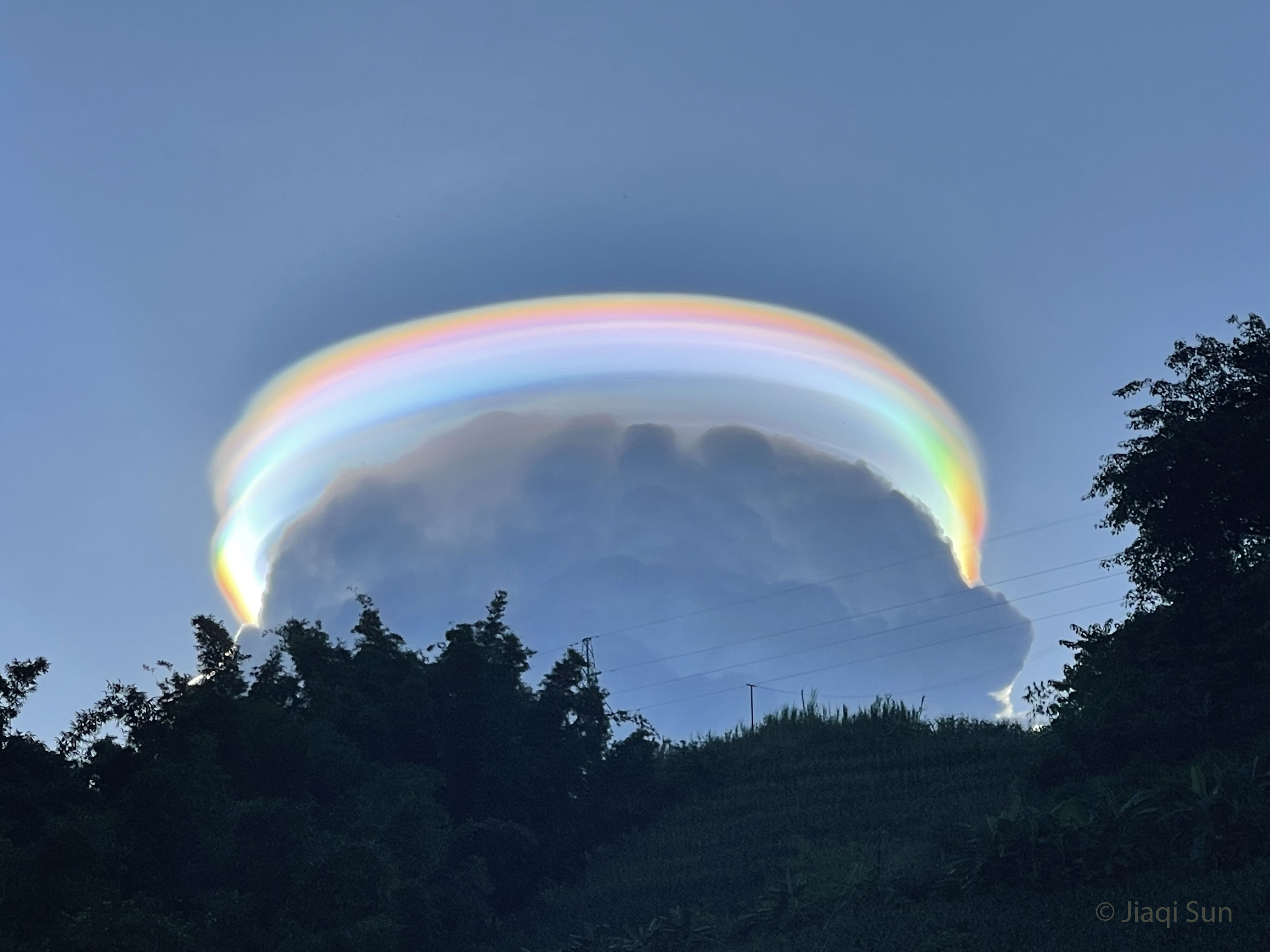 APOD: 2022 September 6 – An Iridescent Pileus Cloud over China