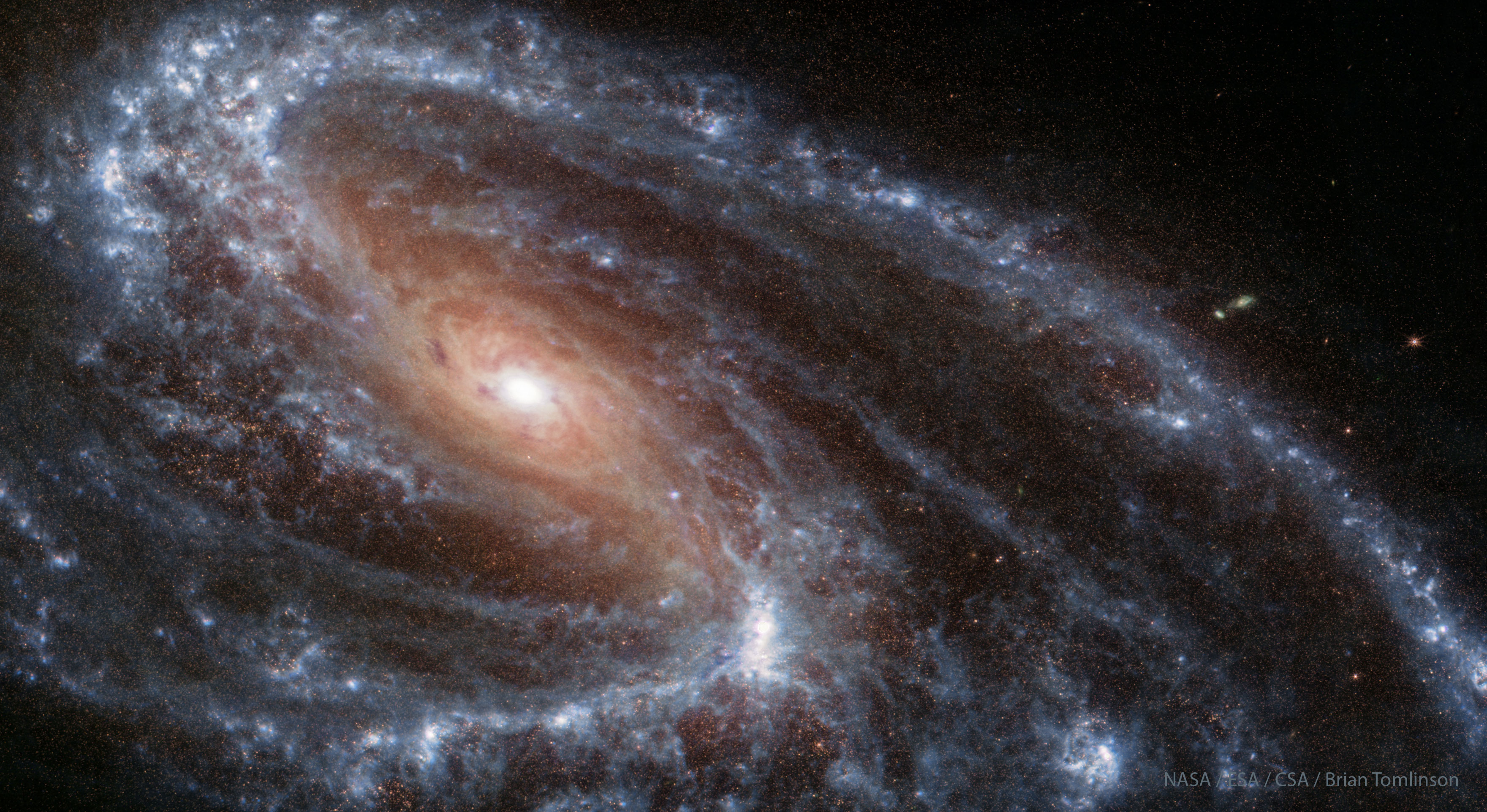 APOD: 2023 August 29 – Unusual Spiral Galaxy M66 from Webb