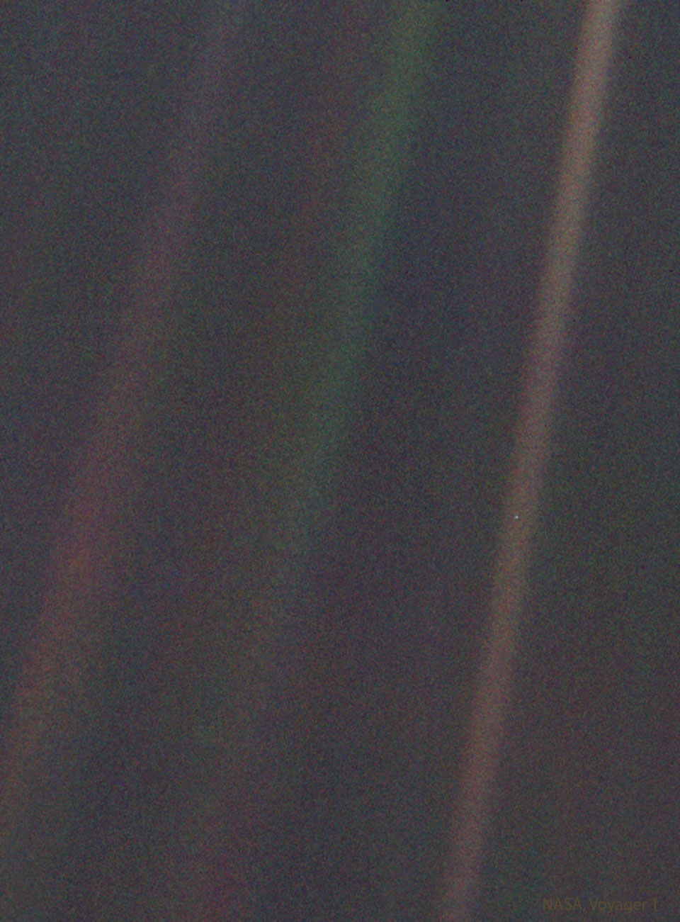 The featured image shows several streaks on a dark background with a pale blue dot in one of the streaks. Please see the explanation for more detailed information.