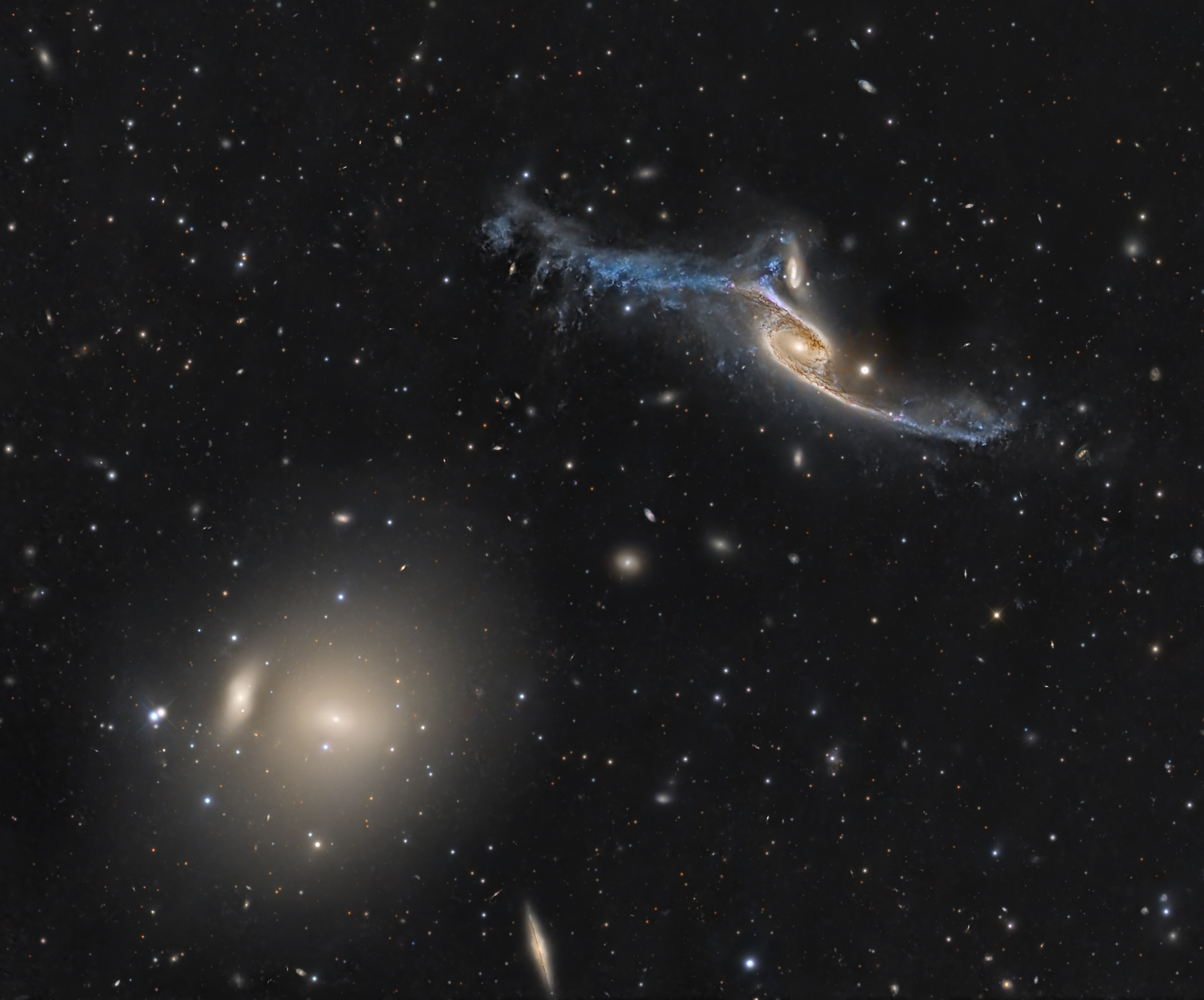 APOD: 2023 June 23 – Giant Galaxies in Pavo