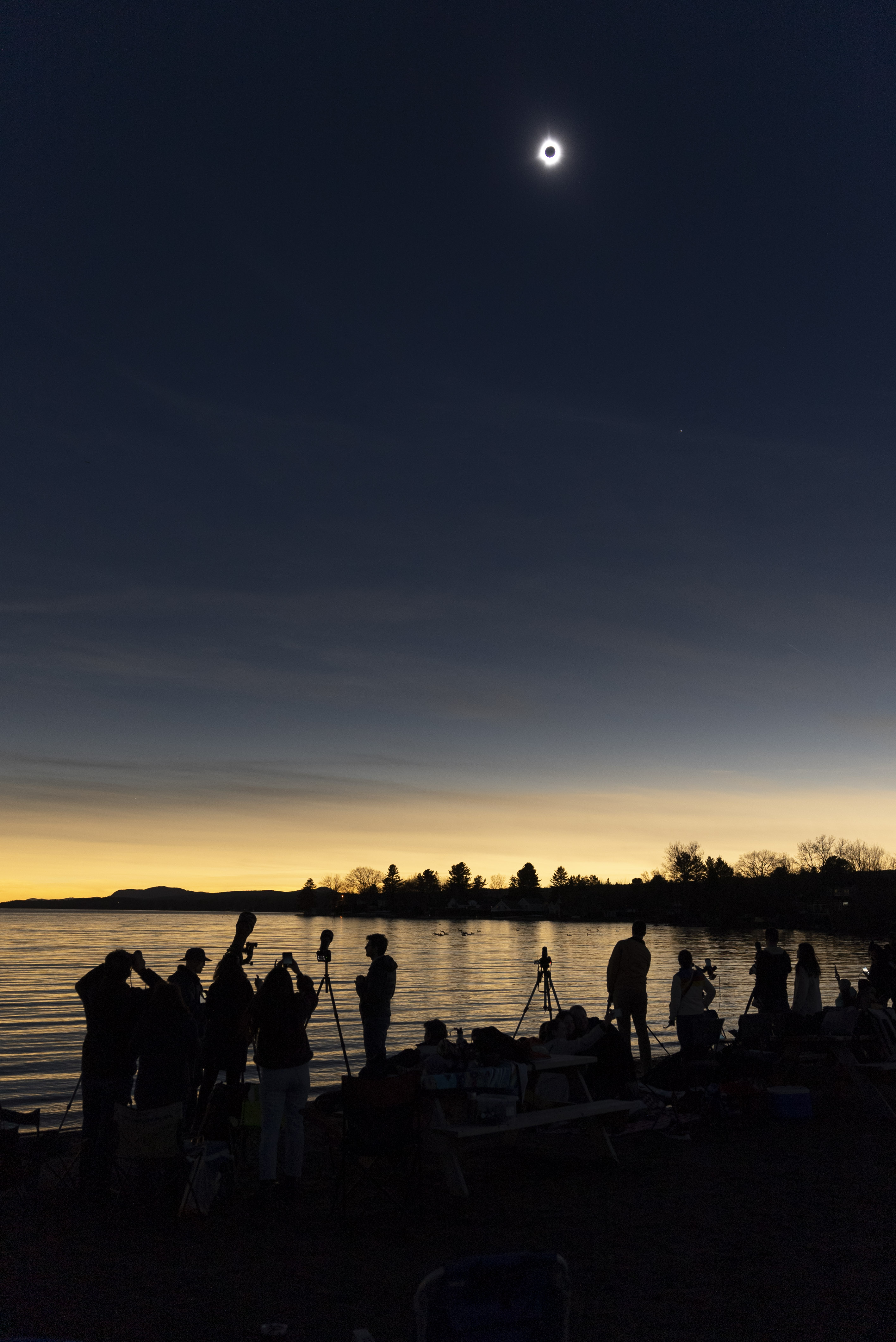 APOD: 2024 April 9 – Moon Shadow over Lake Magog