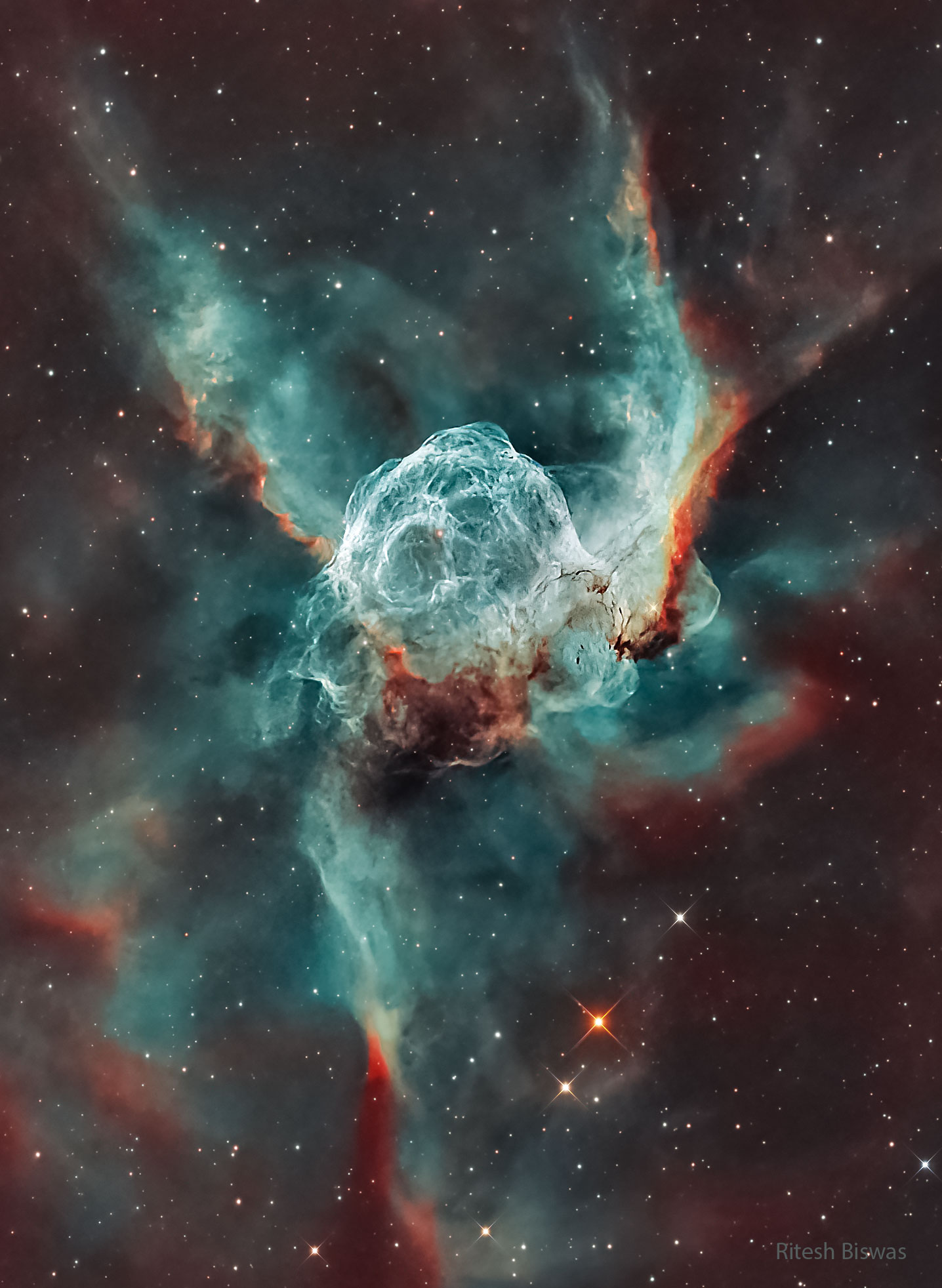 The image shows a starfield with an oval shaped green-tinged nebula in the center. Please see the explanation for more detailed information.