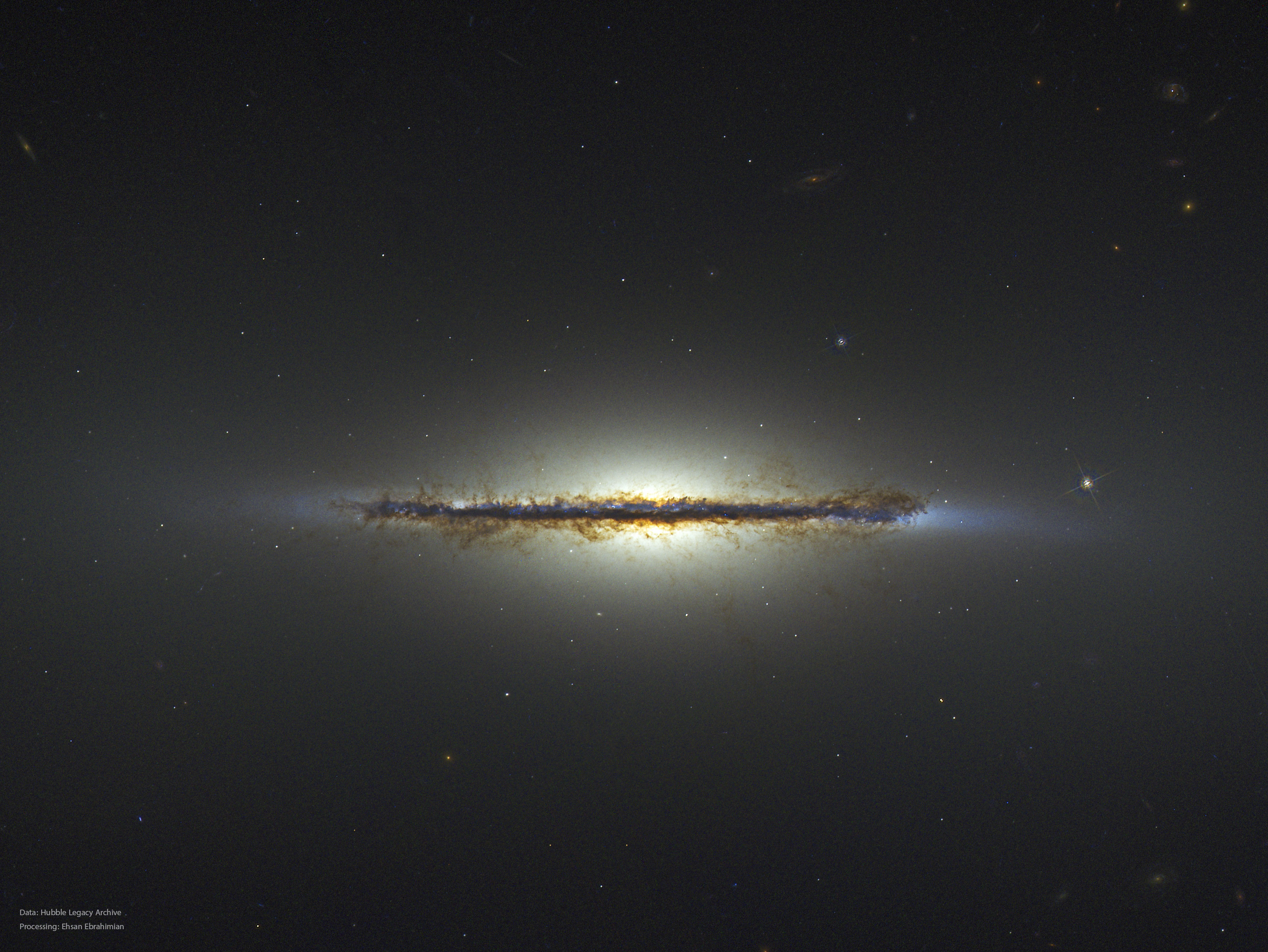 APOD: 2024 March 6 – M102: Edge on Disk Galaxy