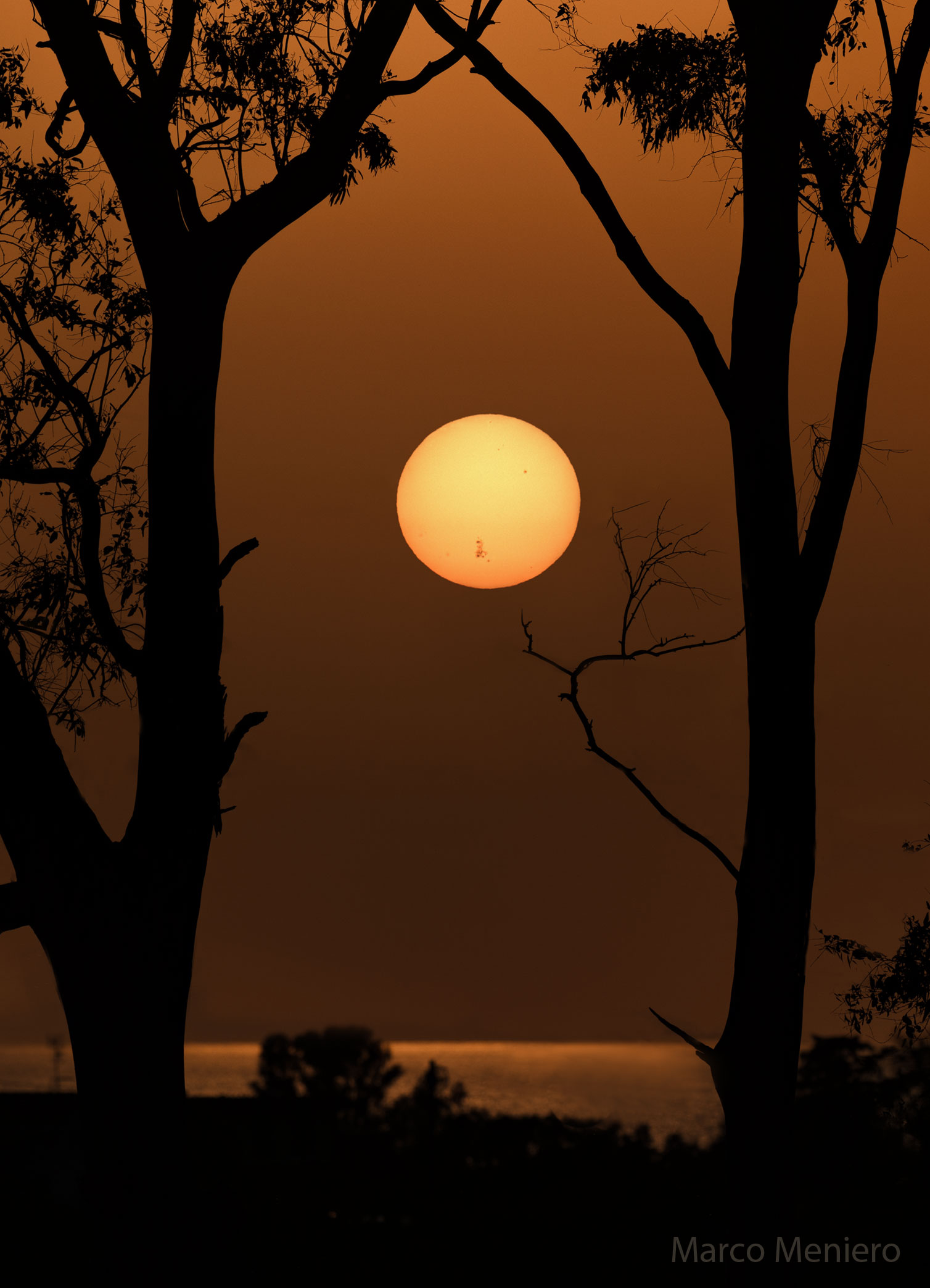 APOD: 2024 May 13 – AR 3664 on a Setting Sun