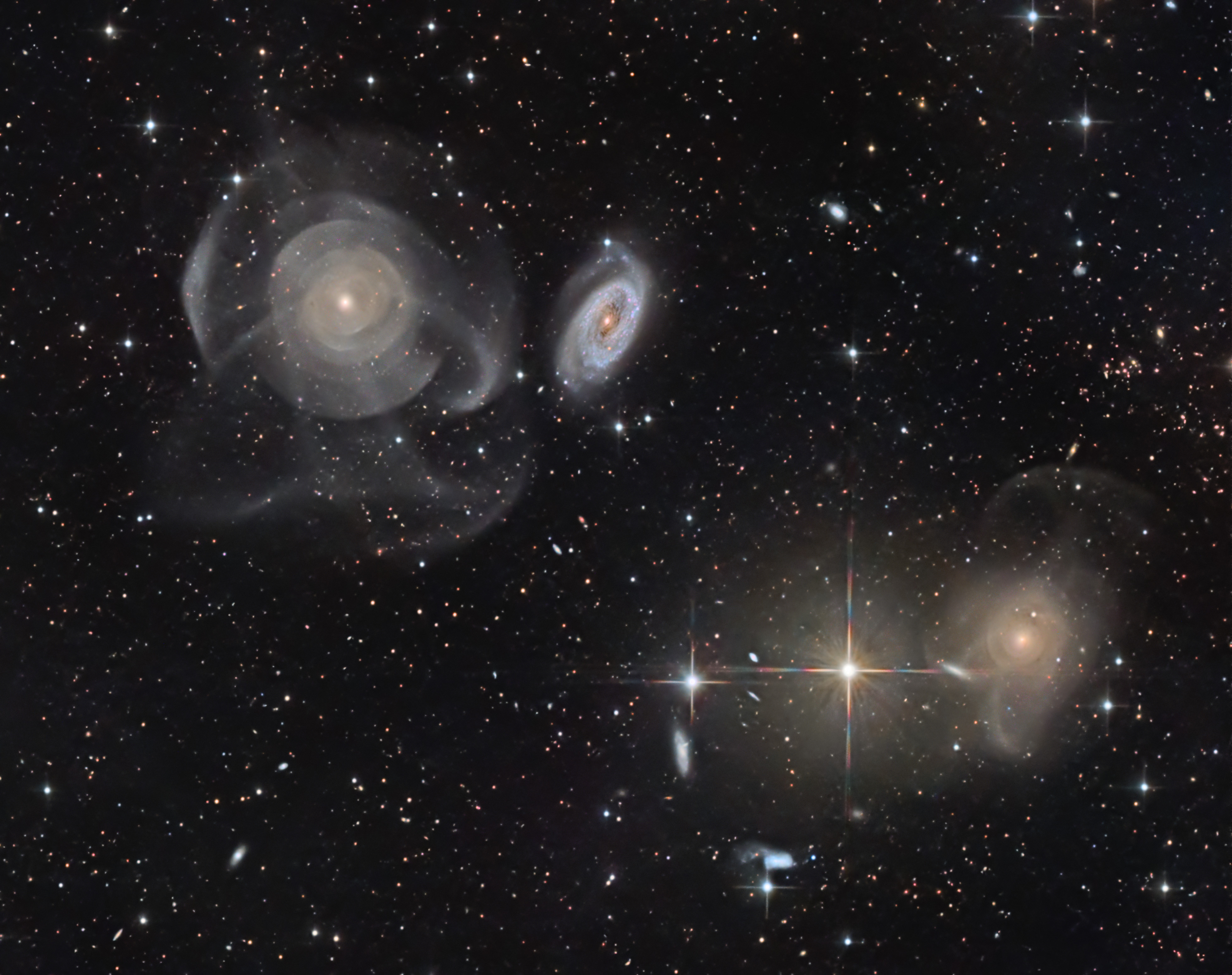 APOD: 2024 November 7 – Shell Galaxies in Pisces