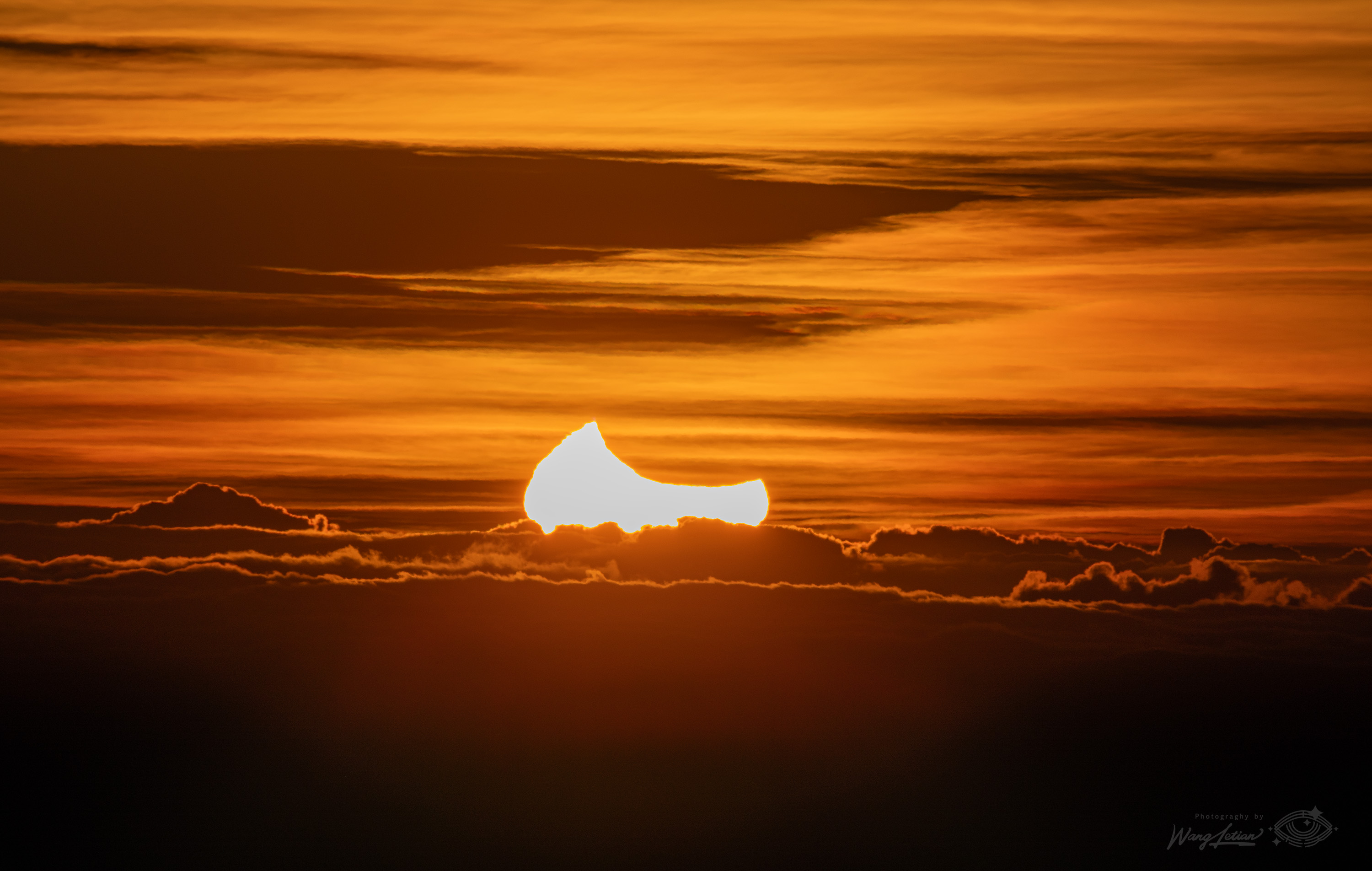 APOD: 2024 October 3 – Eclipse at Sunrise
