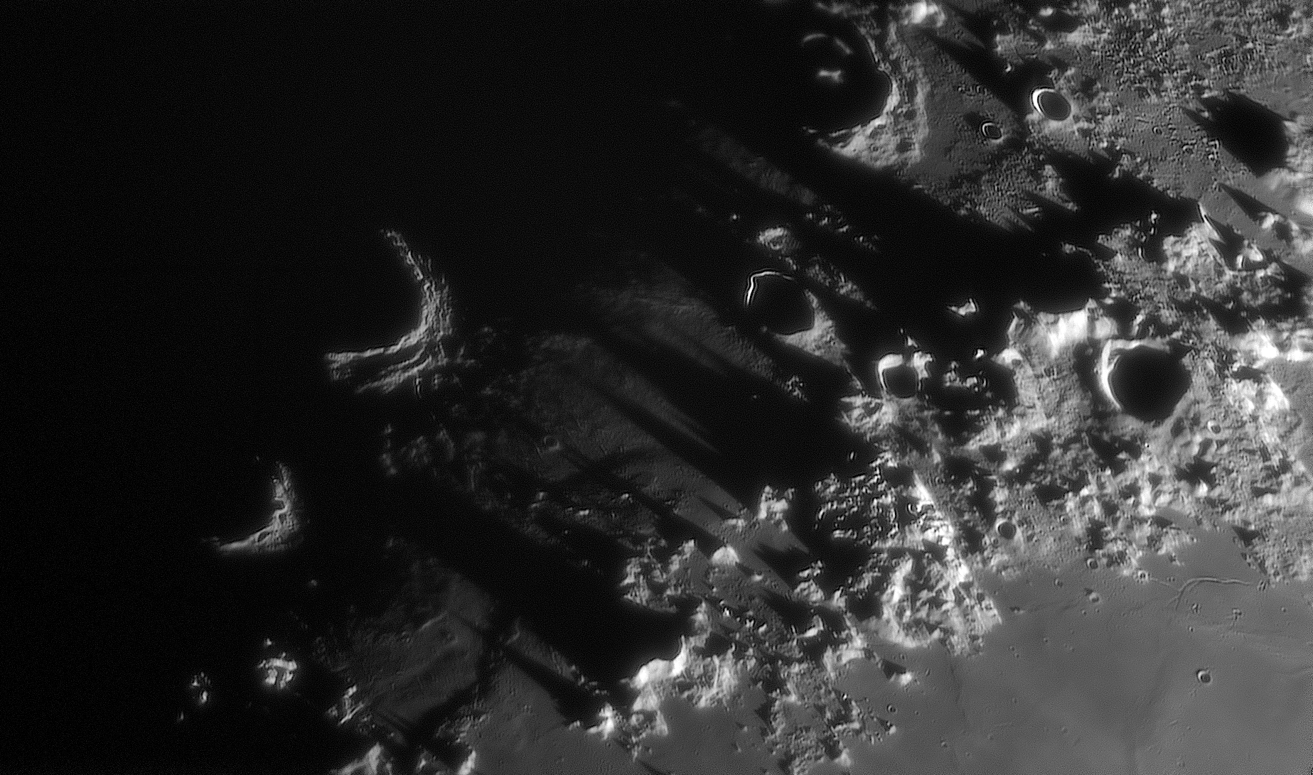 APOD: 2025 December 19 – Long Shadows of the Montes Caucasus