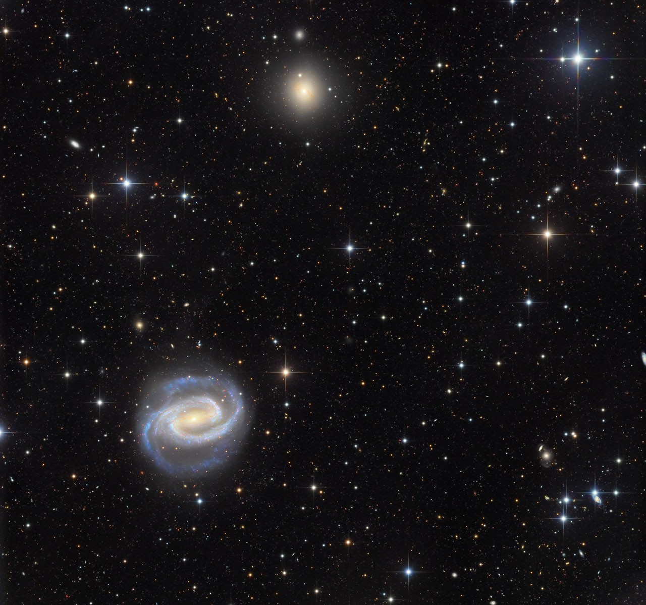 APOD: 2026 March 21 - Galaxies in the River: NGC 1300 and NGC 1297 - NASA Science