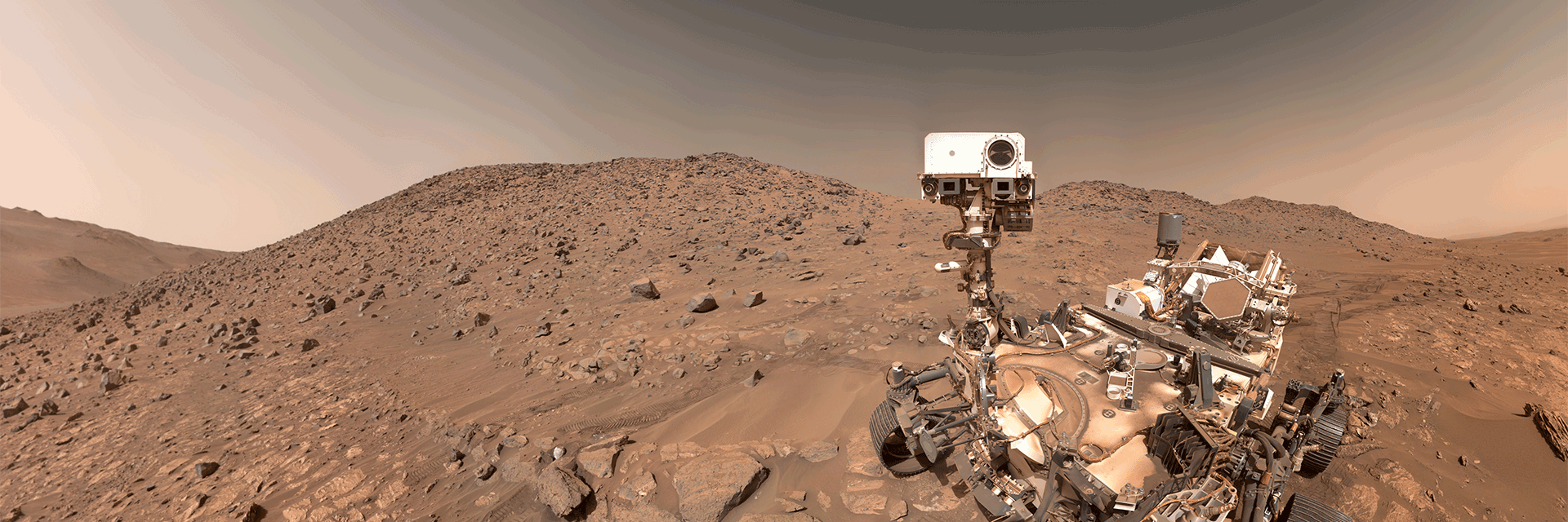 NASA's Perseverance Mars rover took this selfie on July 23, 2024, the 1,218th Martian day, or sol, of the mission. To the left of the rover near the center of the image is the arrowhead-shaped rock nicknamed �Cheyava Falls,� which has features that may bear on the question of whether Mars was home to microscopic life in the distant past. The small dark hole in the rock is where Perseverance took a core sample, which is now in a sample tube stored in the rover�s belly. The white patch to the right of the hole is where the rover used an abrasion tool to clear away the top surface, allowing science instruments to study the rock�s composition.